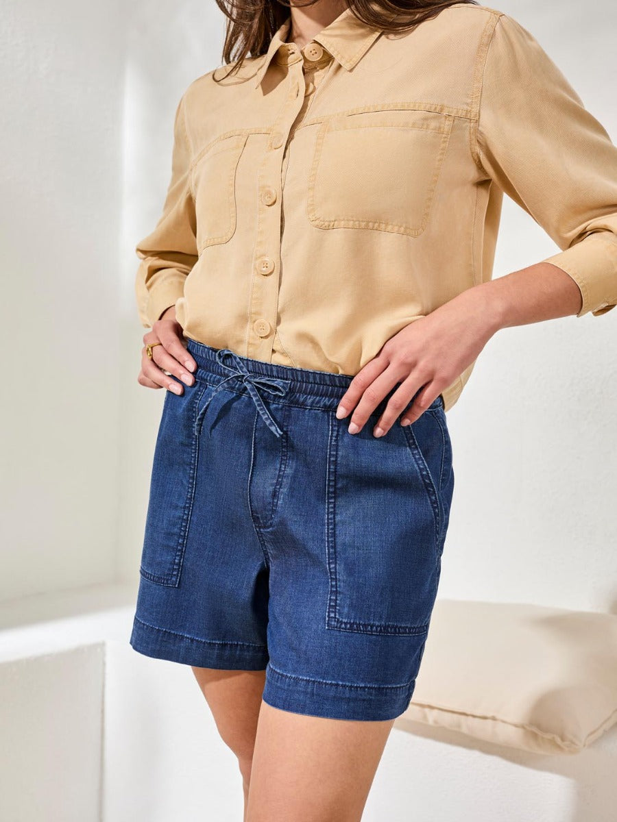 Tribal Audrey Tie-Waist 6" Shorts in dark blue denim by Tribal Sportswear Inc. with front patch pockets and drawstring waist