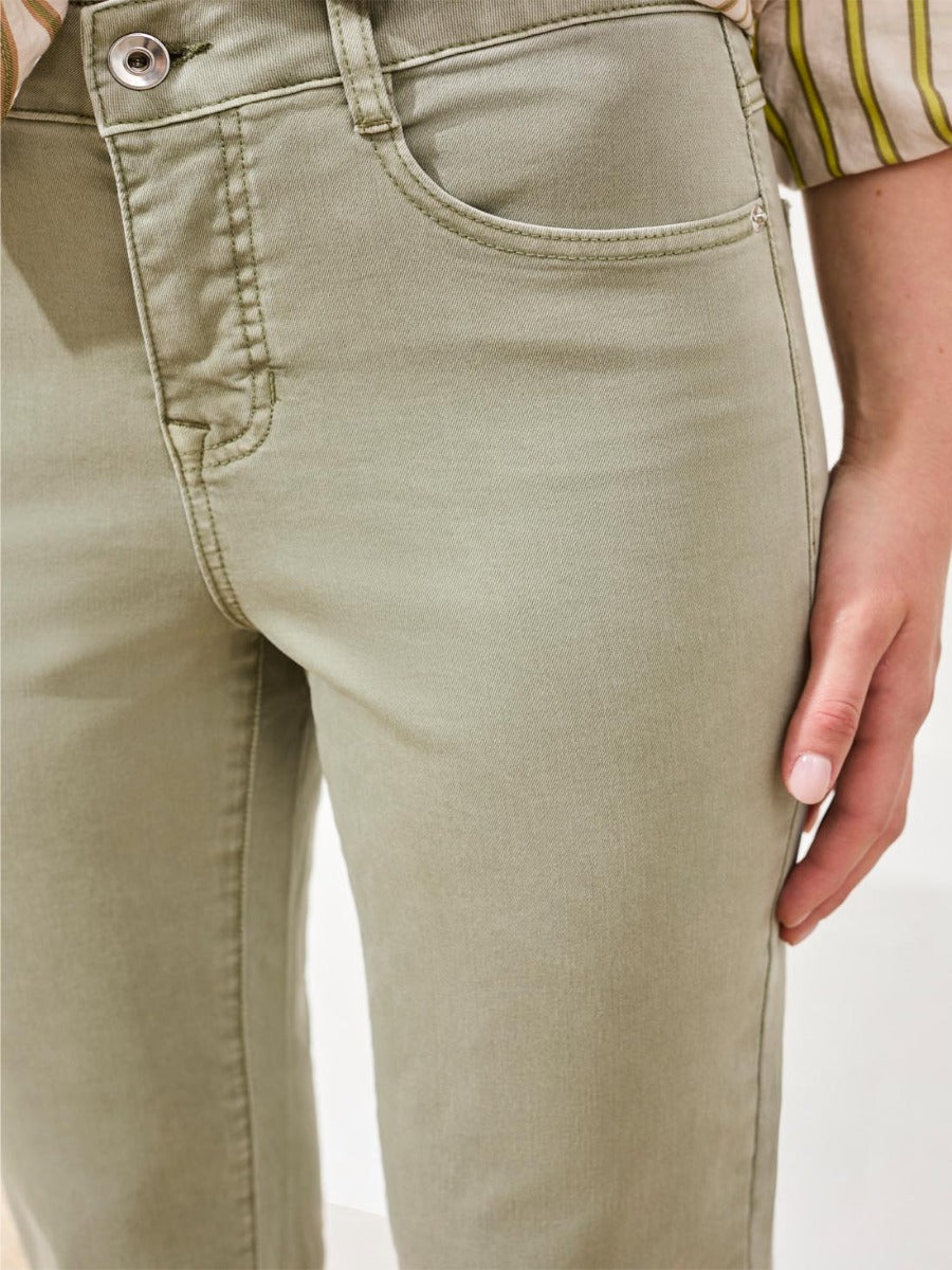 Close-up of light sage denim Tribal Sophia Curvy Fit 28" Straight Jeans by Tribal Sportswear Inc. with detailed stitching