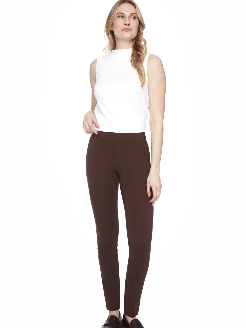 Up Ponte Basic Slim Pant 31" in brown, slim fit style by Up modeled with a white sleeveless top.