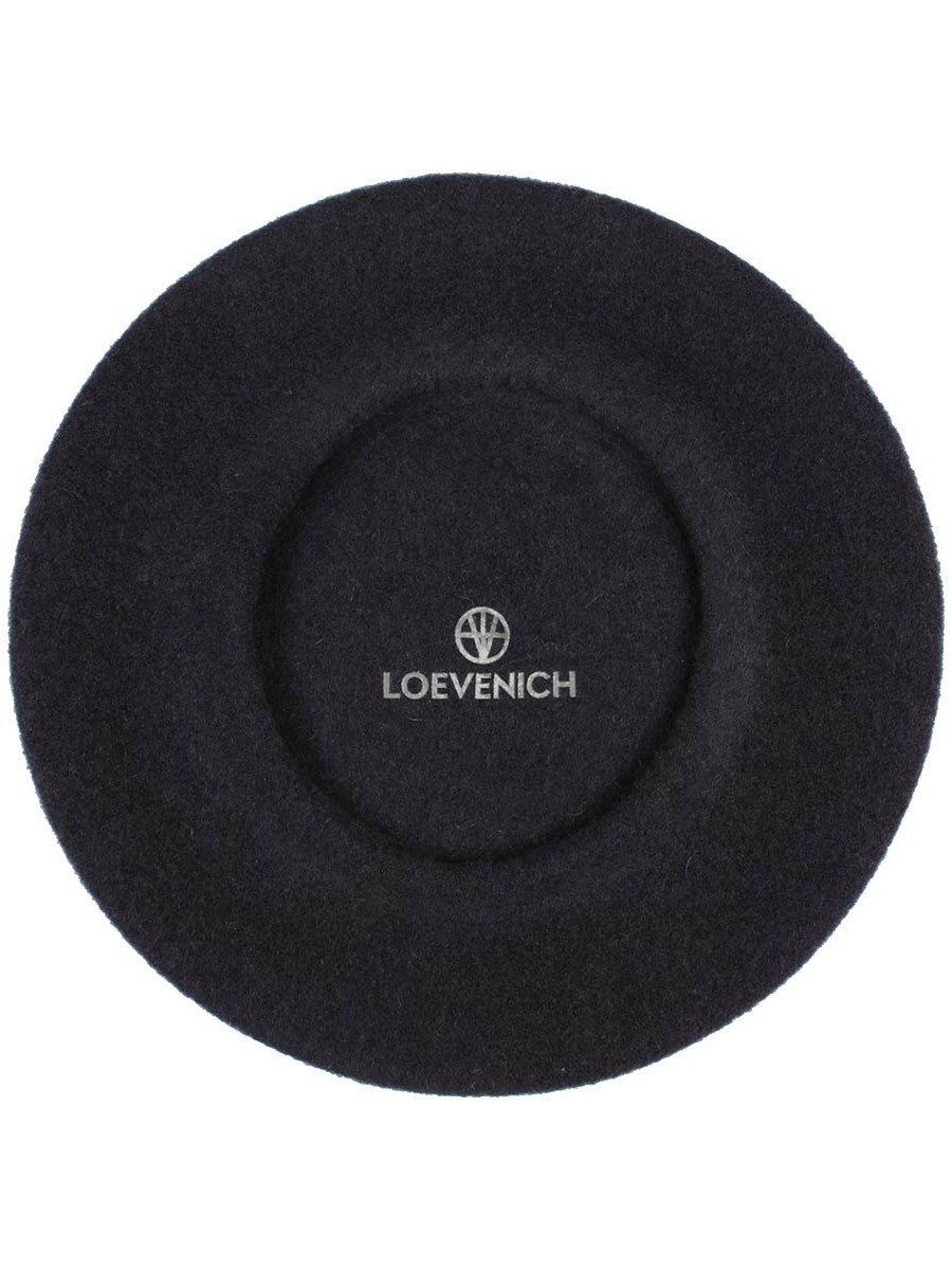 Black beret with a centered LOEVENICH logo and circular stitched crown detail