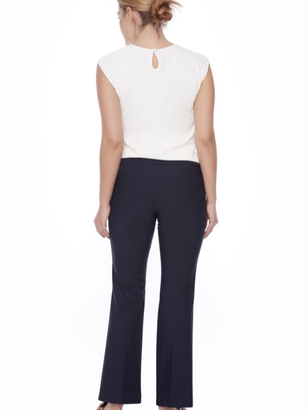 Up Precision Ponte Slim Boot 31" Pant in navy shown from the back with a white sleeveless top by Up.