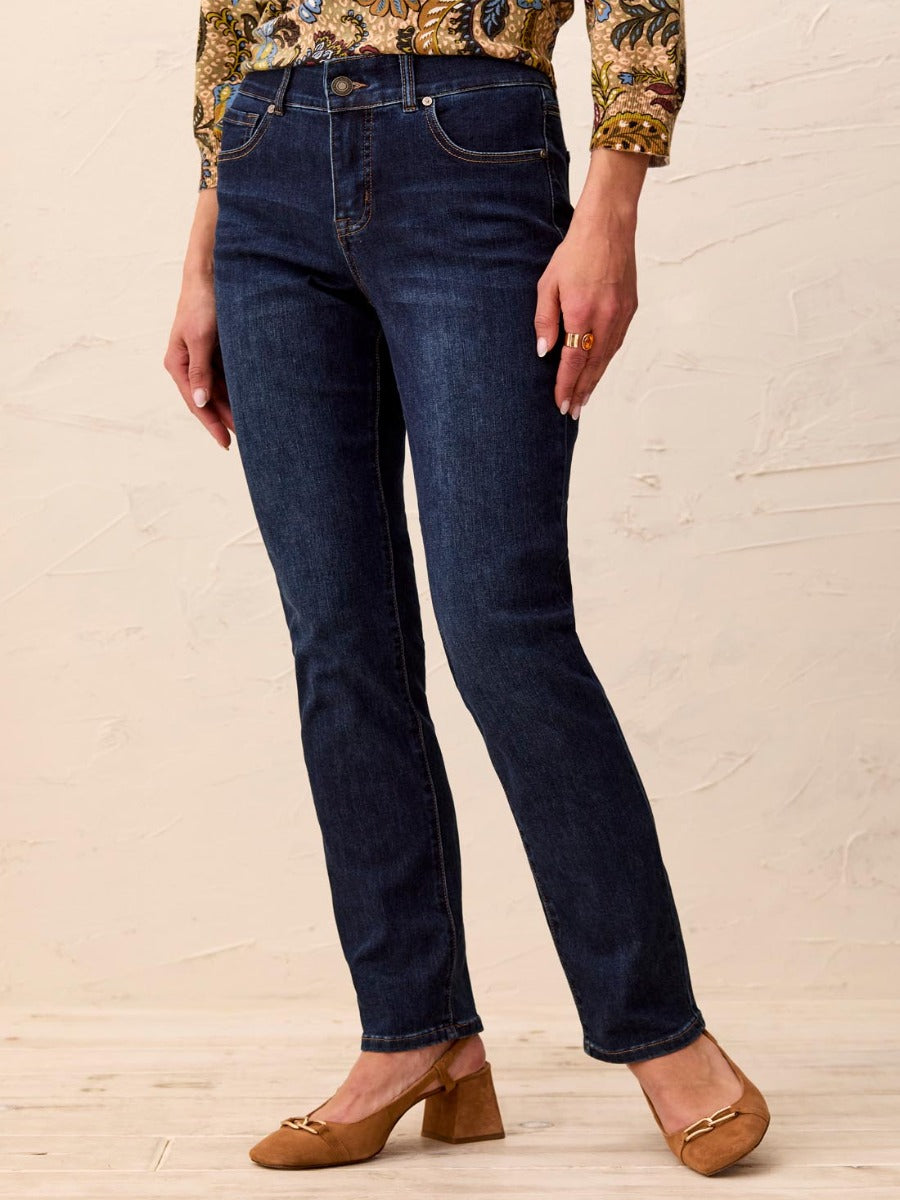 Dark denim Tribal Sophia Curvy Straight Leg Jeans paired with brown heels, by Tribal Sportswear Inc.