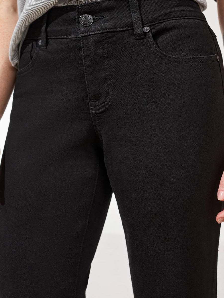Close-up of black denim Tribal Sophia Straight Leg Petite Jeans by Tribal Sportswear Inc. showing front pocket details.