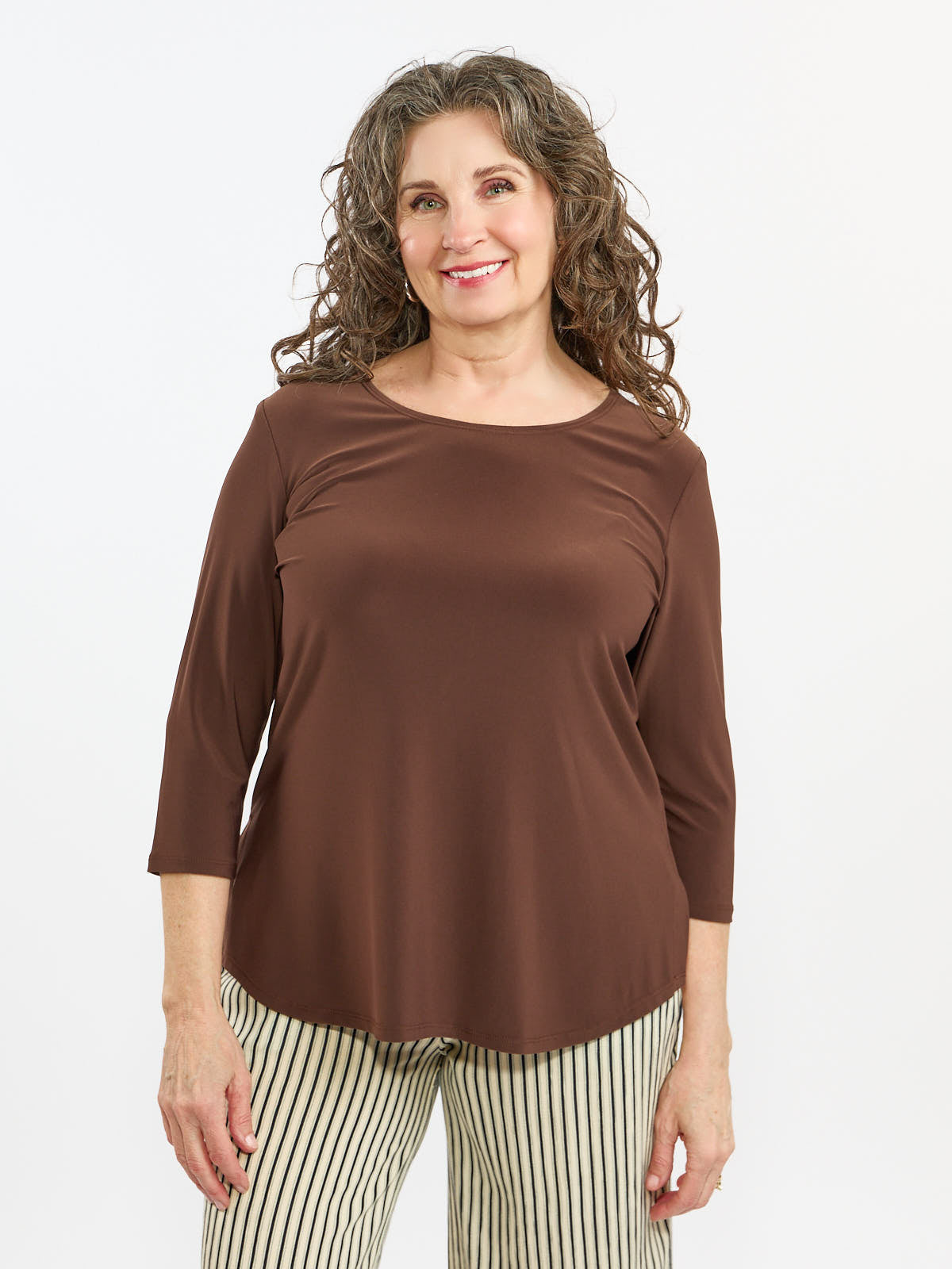 Elizabeth Scoop Neck 3/4 Sleeve Essential Top in brown by Bali Corp., styled with striped pants, casual long sleeve top.