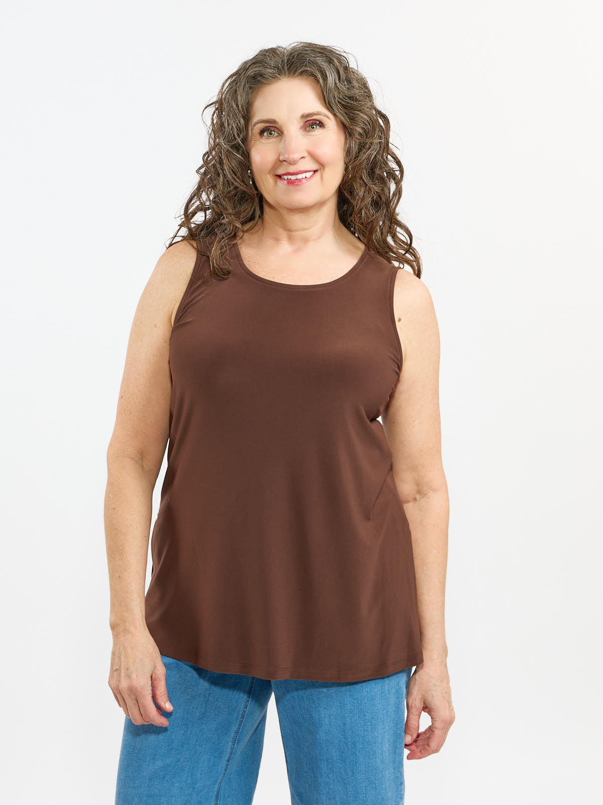 Brown sleeveless Liz Sleeveless Tank Side Slit Top by Bali Corp. styled with blue denim jeans.