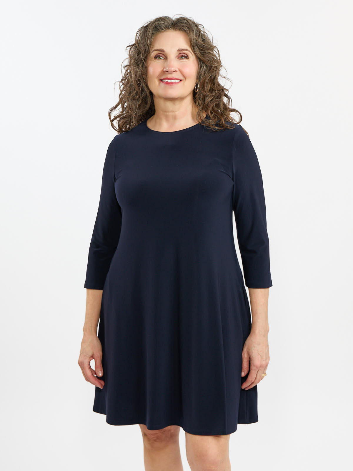 Navy blue Sandra 3/4 Sleeve ITY Pocket A-Line Dress by Bali Corp. with a simple, elegant design and knee length.