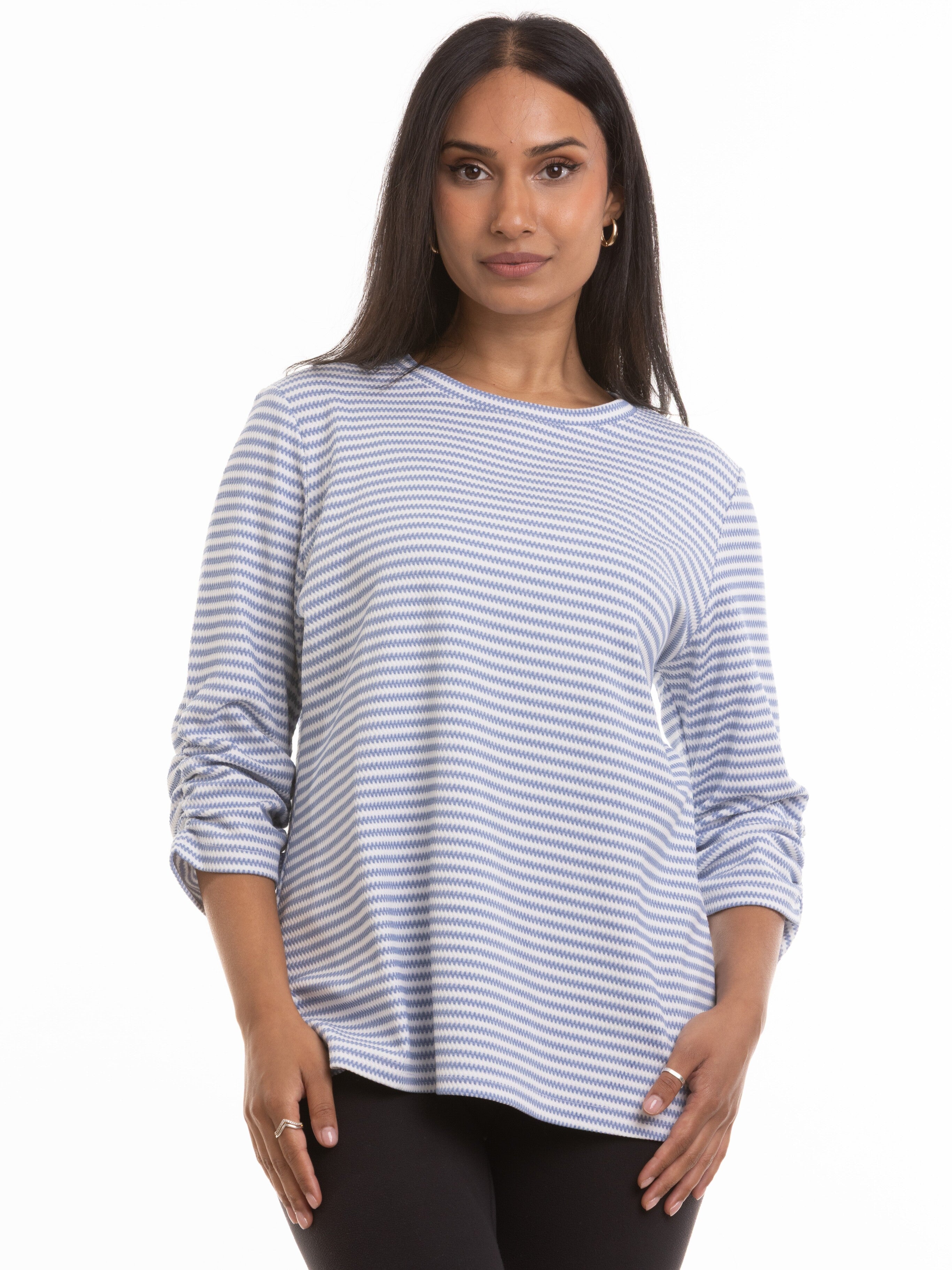Light blue and white striped Zig Zag Stripe 3/4 Sleeve Knit Top by Nulook Fashions styled with black pants