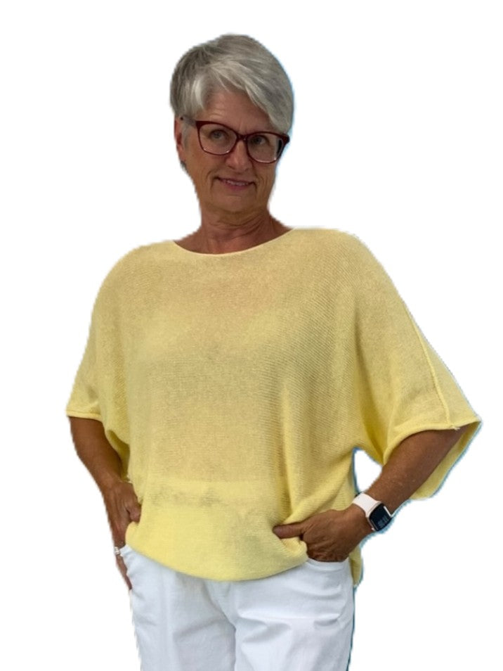 Pop Me Over Oversized 3/4 Sleeve Knit Top by Plum Loco in soft yellow knit sweater style with relaxed fit and white pants