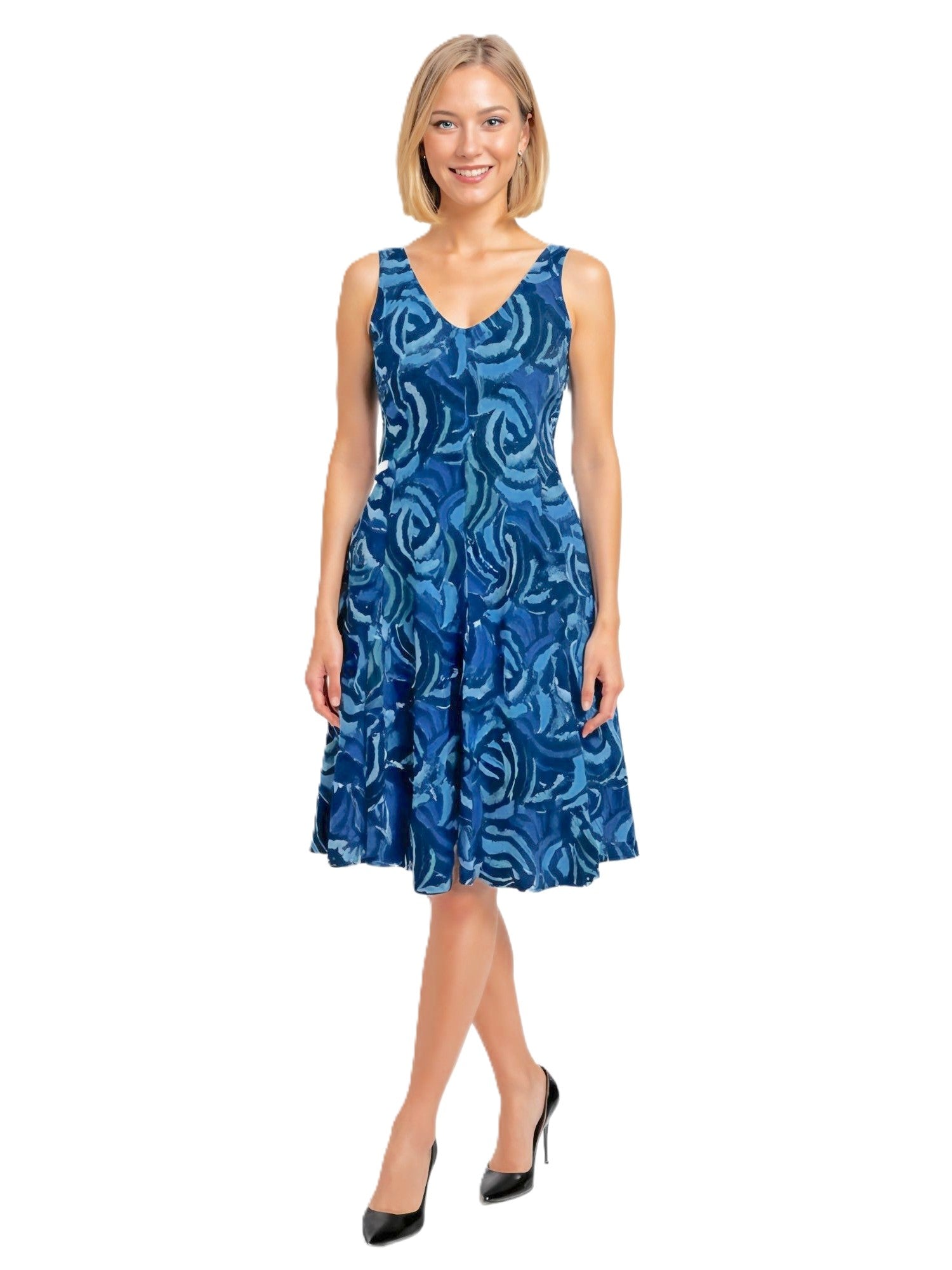 Creation Karla Sleeveless Floral V-Neck Dress in blue floral pattern by Creations, styled with black heels.