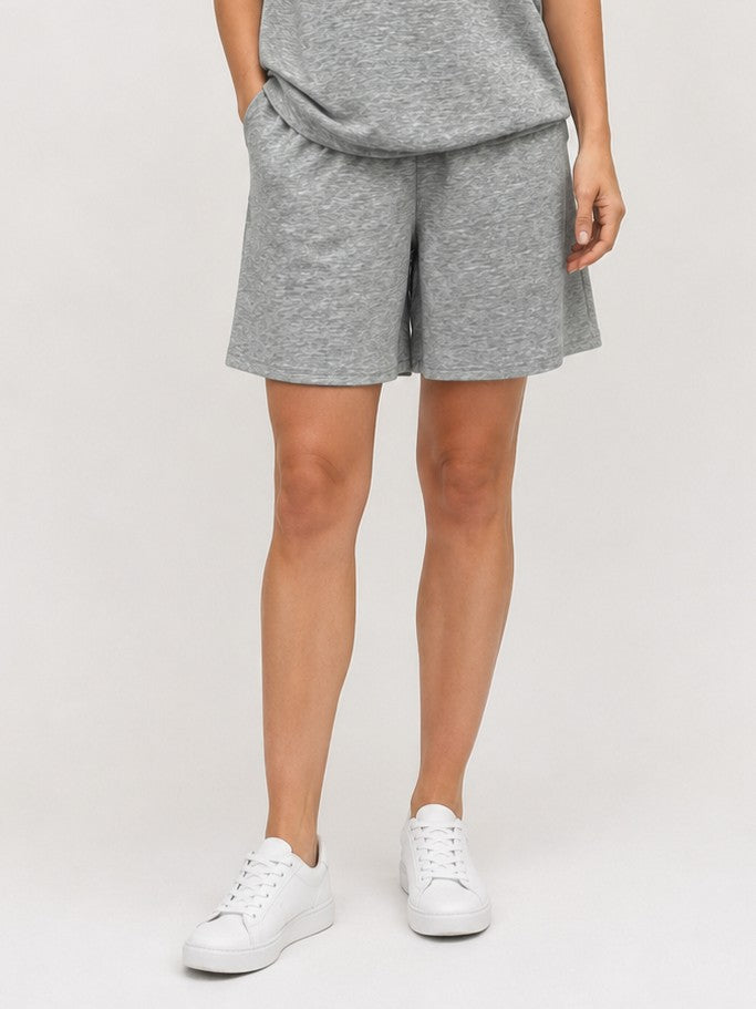 Grey casual shorts with an elastic waistband, styled with white sneakers, Creation Lulu Pull-On Shorts by Creations