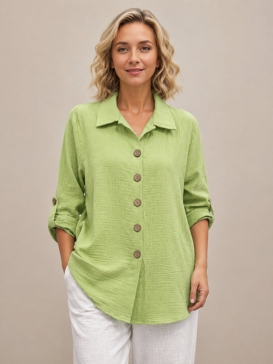 Creation Wooden Button Bubble Hem Top in light green with wooden buttons and rolled-up sleeves by Creations.