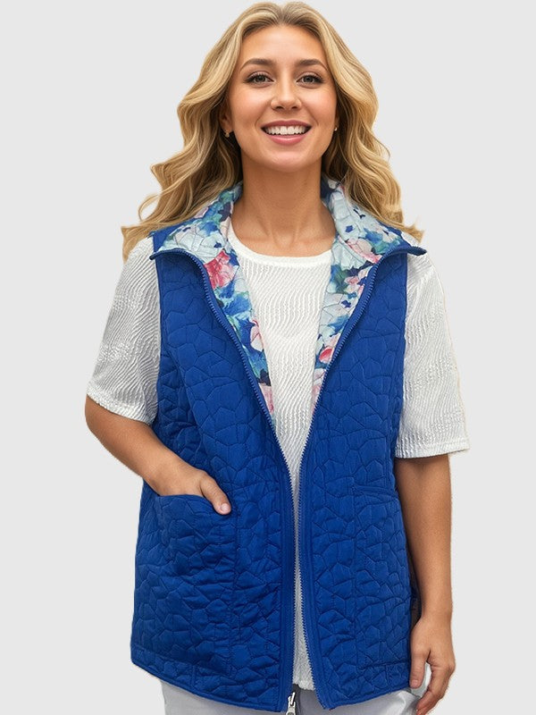 Creation Lily Reversible Printed Vest by Creations in blue with floral inner lining, quilted outerwear accessory.