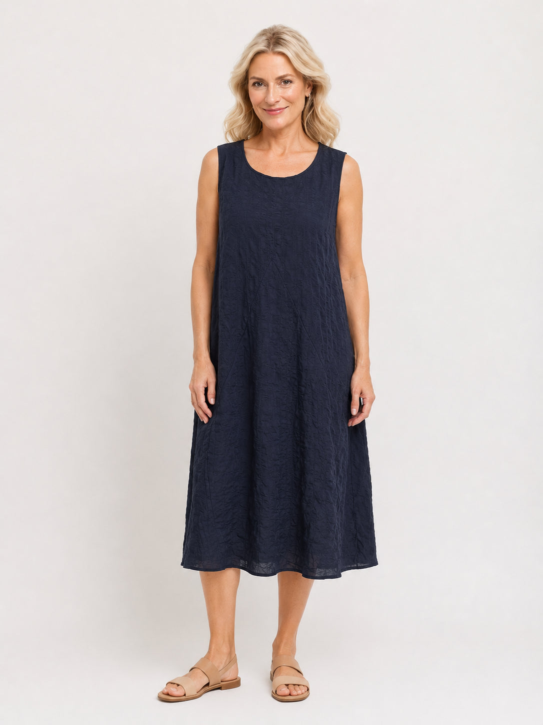 Creations navy sleeveless midi dress with textured fabric, designed as Creation Popcorn Bubble Sleeve Midi Dress.