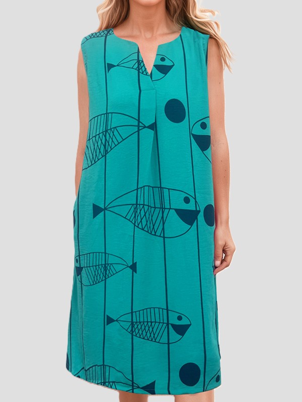Turquoise Creation Fish Print Sleeveless Pocket Dress by Creations with navy fish and dot design details.