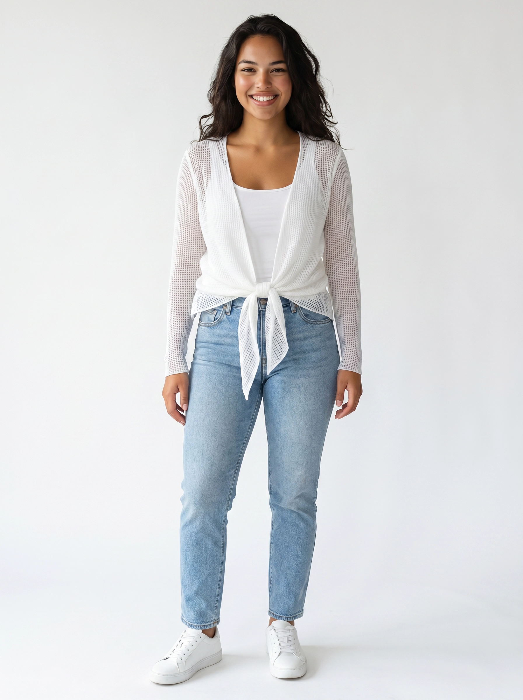 Covered In Sparkle Sheer Mesh Tie Front Cardigan by Creations in white sheer mesh worn over a white top with light denim jeans