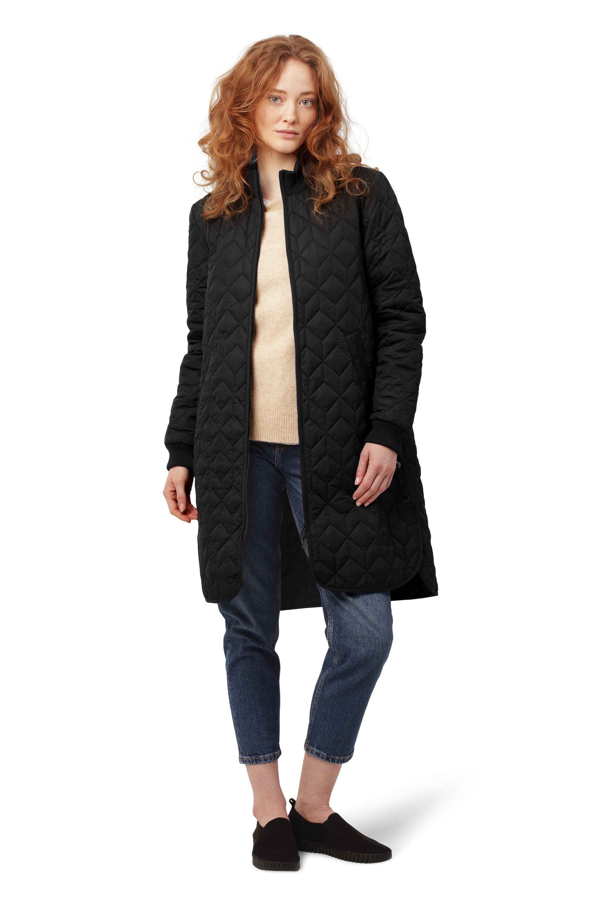 Ilse Jacobsen Quilted Coat in black with diamond pattern, styled with casual jeans and beige sweater by Ilse Jacobsen