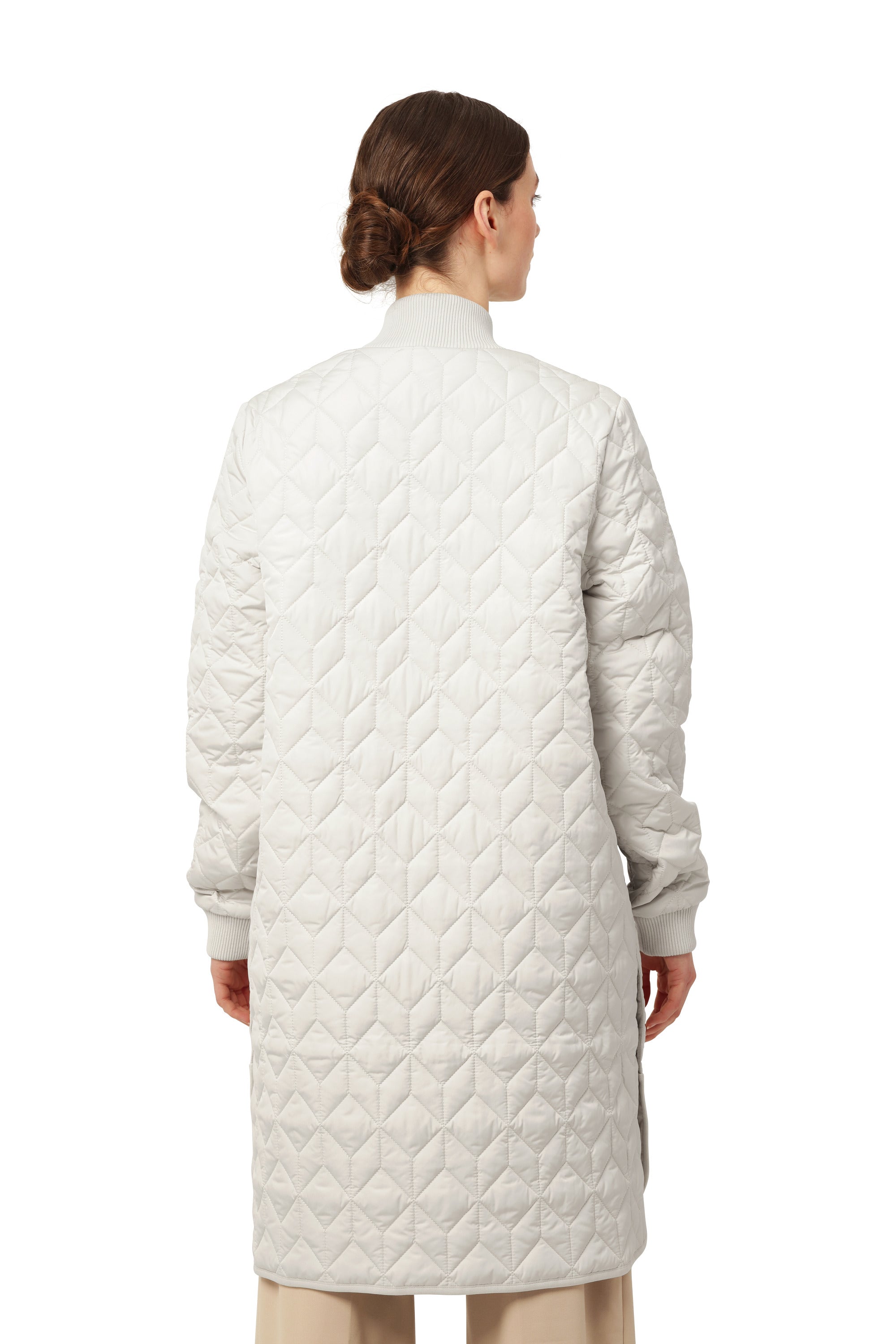 Back view of a cream Ilse Jacobsen Quilted Coat showcasing detailed quilted outerwear design by Ilse Jacobsen