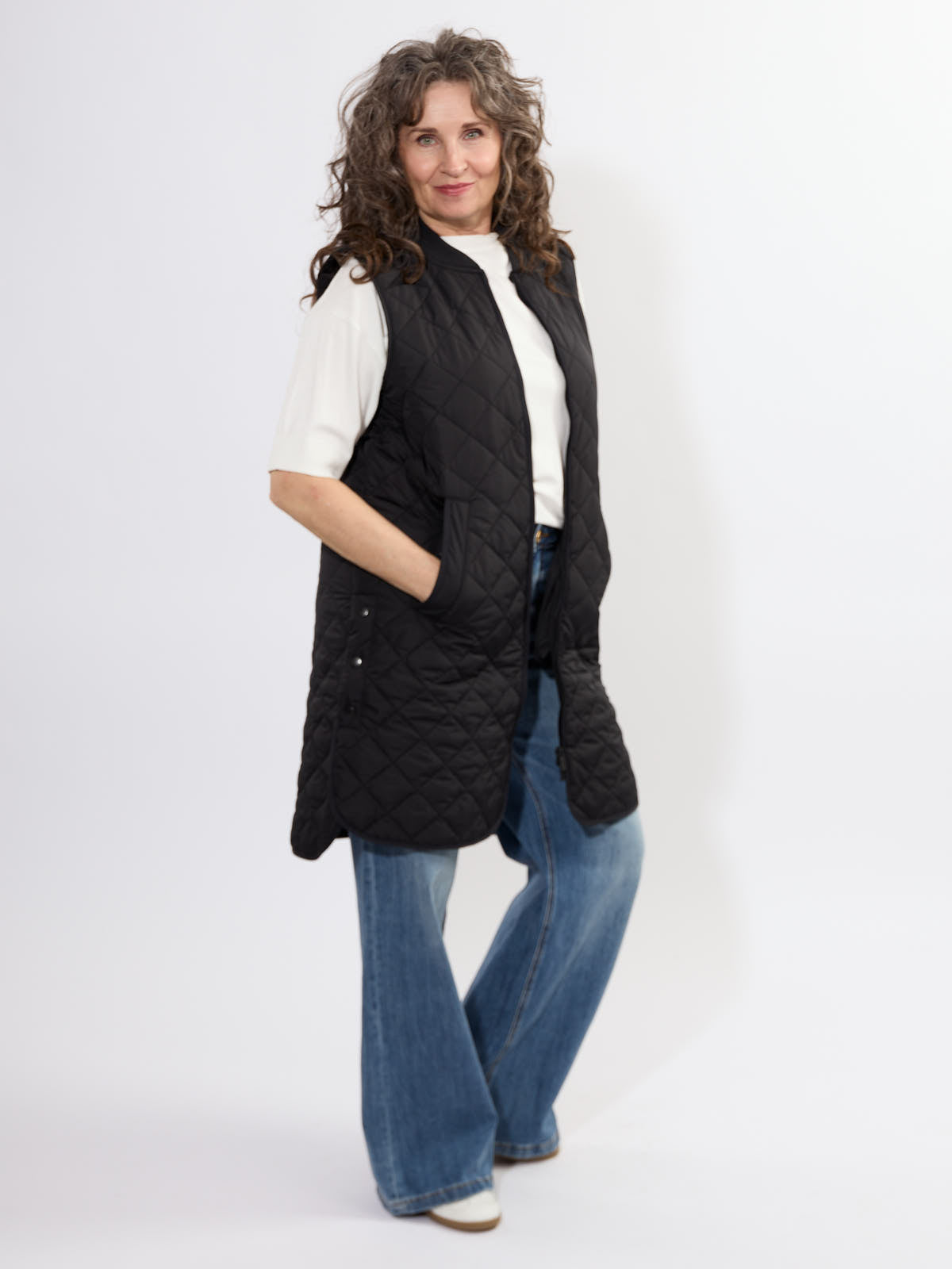 Ilse Jacobsen Quilted Vest in black, lightweight outerwear styled casually with jeans and a white top
