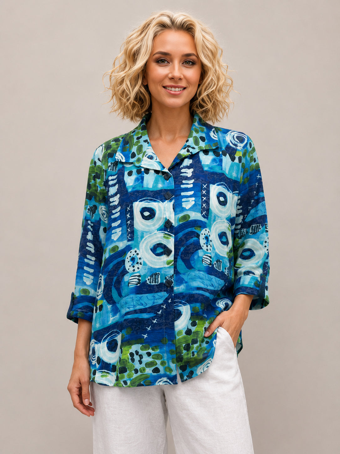 Creation Orient Button Tulip Jacket by Creations in blue and green abstract print, styled with white pants, casual outerwear.
