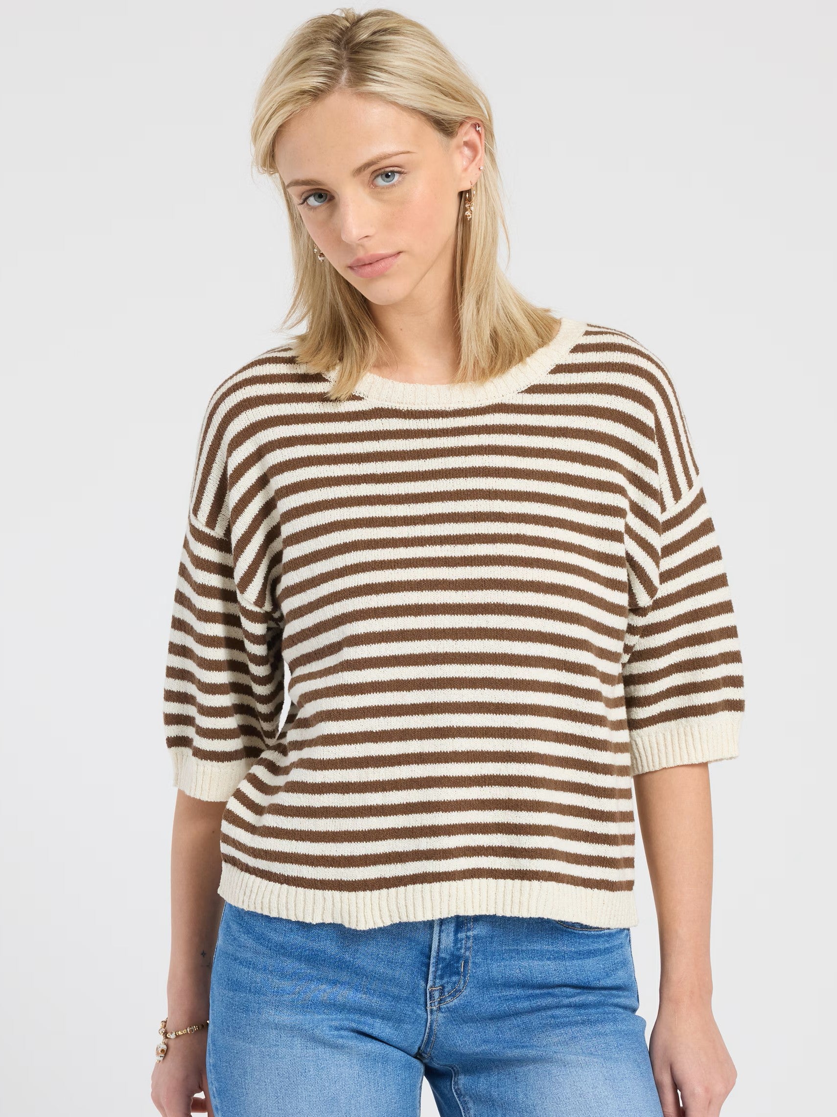 Striped Raw Edge Short Sleeve Crew Top by Mine in brown and cream stripes paired with blue denim jeans.