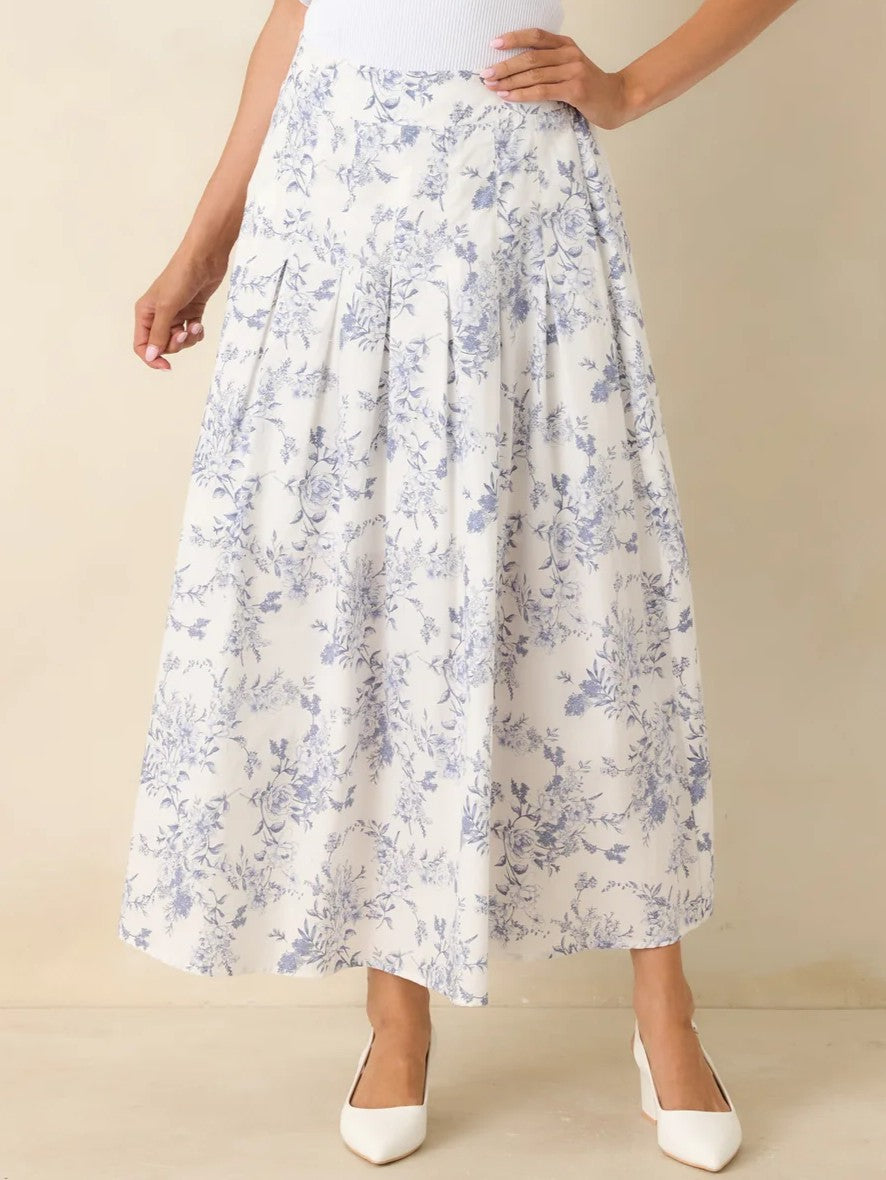 Floral Toile Print Midi Skirt by Mine in white with delicate blue floral design and pleated detailing.