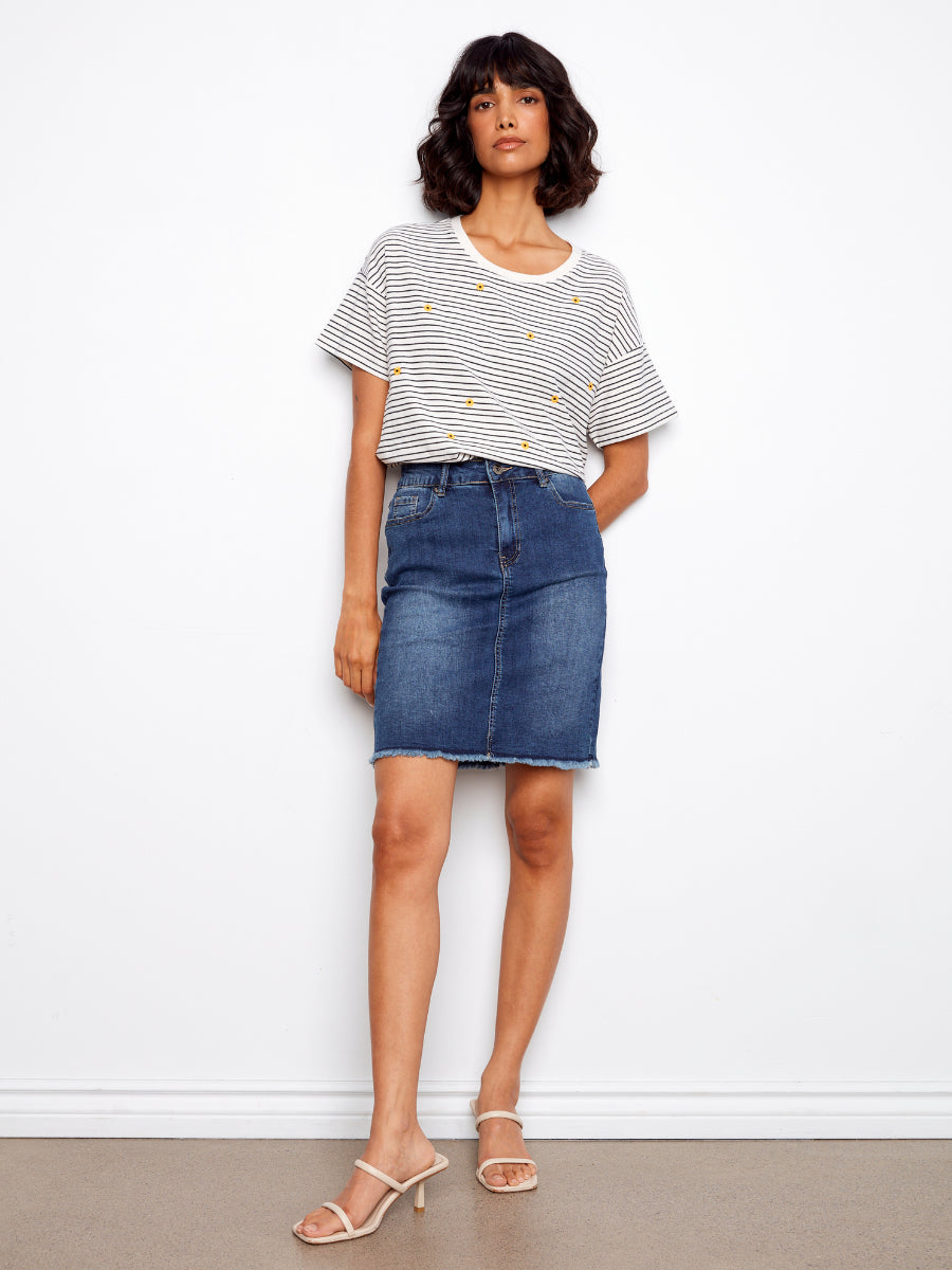 Charlie B Daisy Graphic Cotton T-Shirt styled with denim skirt, featuring striped fabric with small daisy graphics by Charlie B.