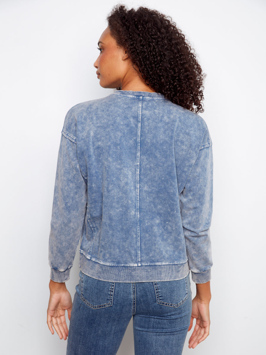Back view of Charlie B Daisy Washed Terry Crew Neck Sweatshirt in faded denim blue by Charlie B