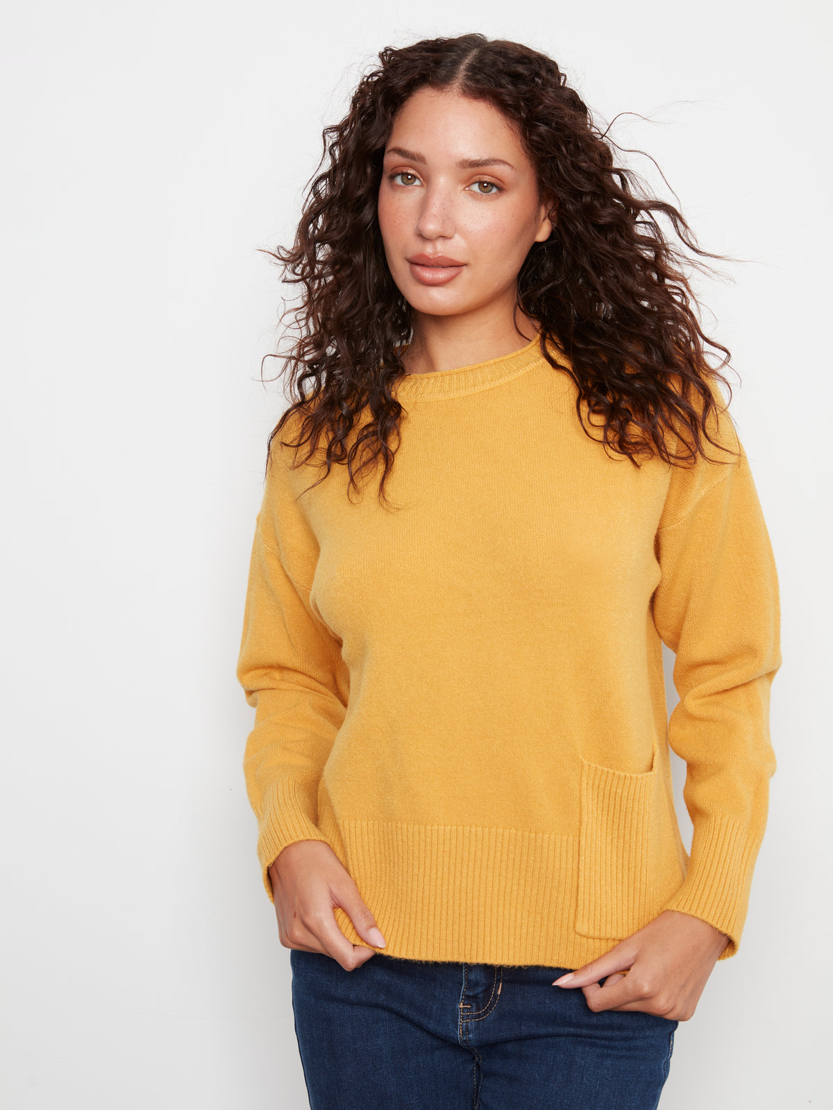 Charlie B Side Pocket Plushy Rib Crew Neck Sweater in mustard yellow with ribbed hem and side pocket by Charlie B