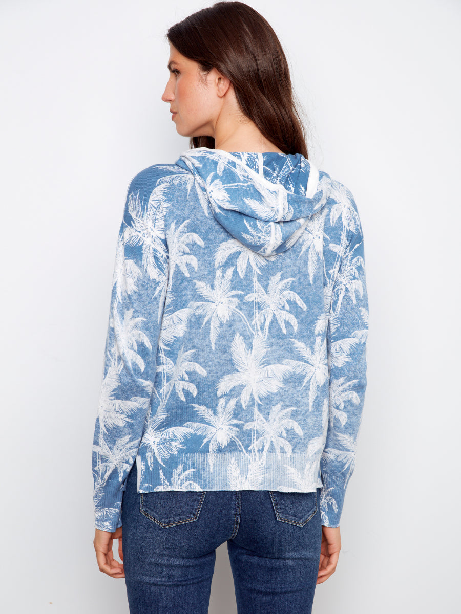 Back view of Charlie B Palms Tropical Hooded Pullover Top in blue with white palm print sweater by Charlie B.