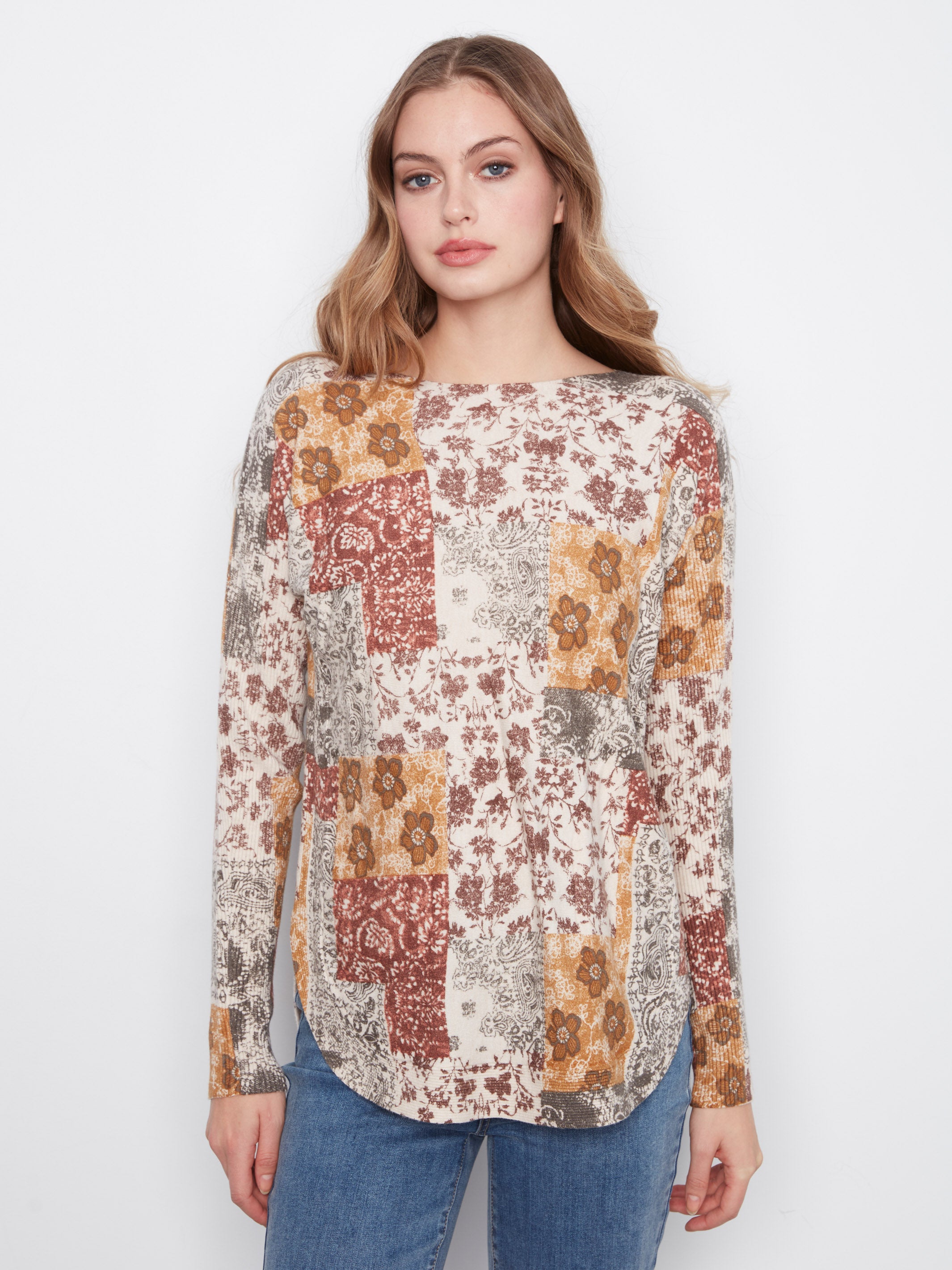 Front view of Charlie B Blends N Trends Print Crew Neck Sweater with floral patchwork design by Charlie B, styled with denim.