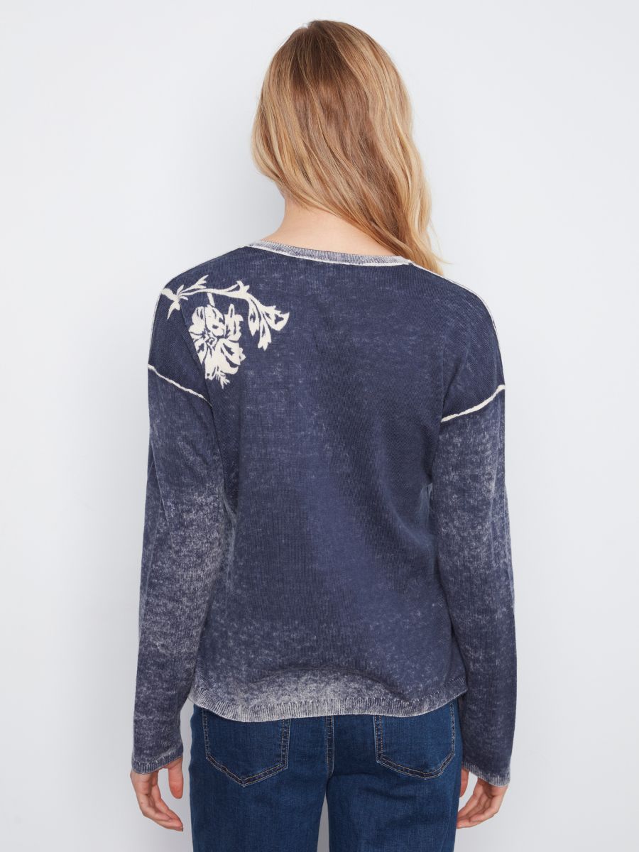 Navy blue long sleeve sweater with faded texture and white floral embroidery on the upper back shoulder area.