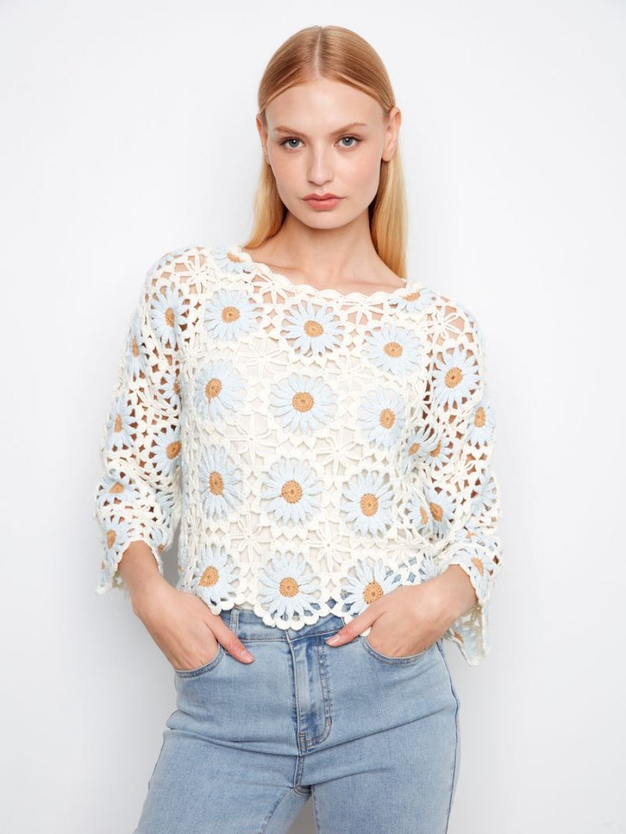 Charlie B Floral Crochet Crew Neck Top in white with daisy patterns paired with light blue jeans by Charlie B