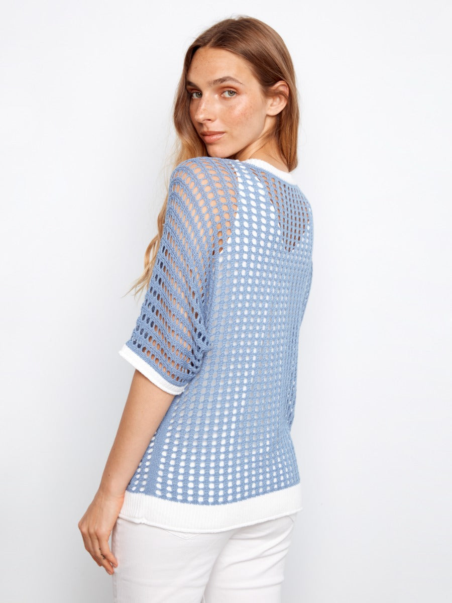 Charlie B Daisy Crochet Sleeveless V-Neck Top in blue crochet knit with white trim, styled by Charlie B, lightweight summer top.