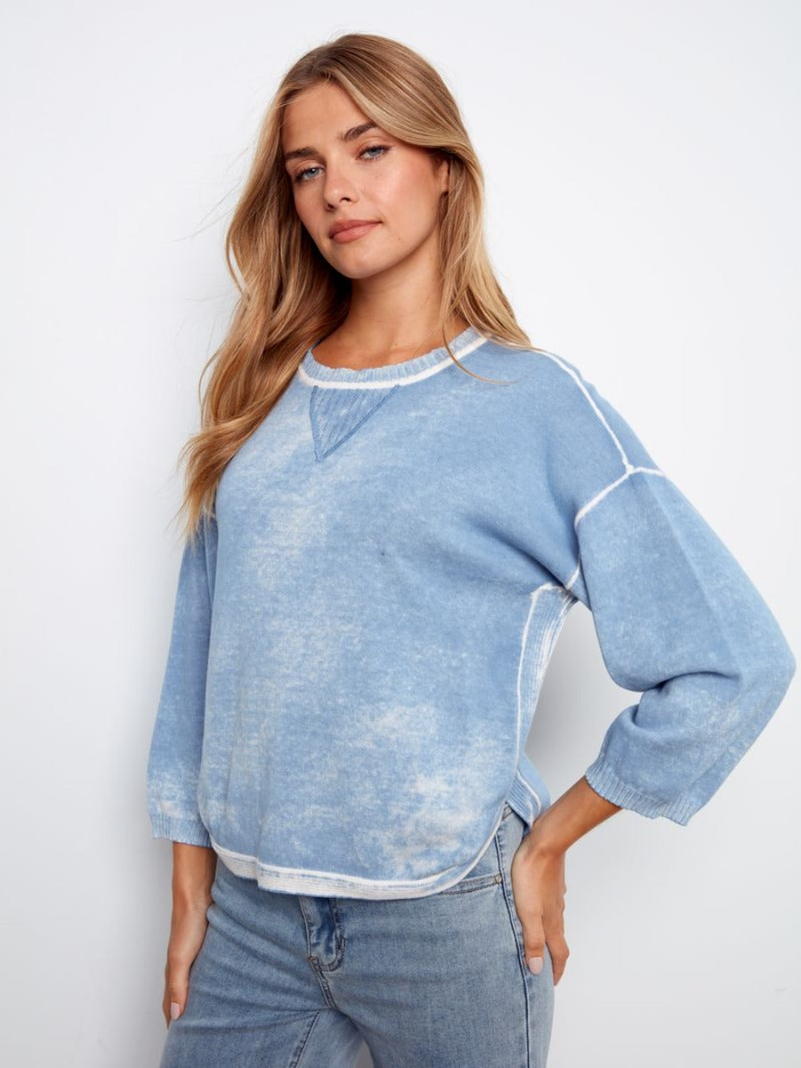 Charlie B Skylar Washed Cotton Ribbed Crew Neck Sweater in light blue with white stitching, styled with denim jeans