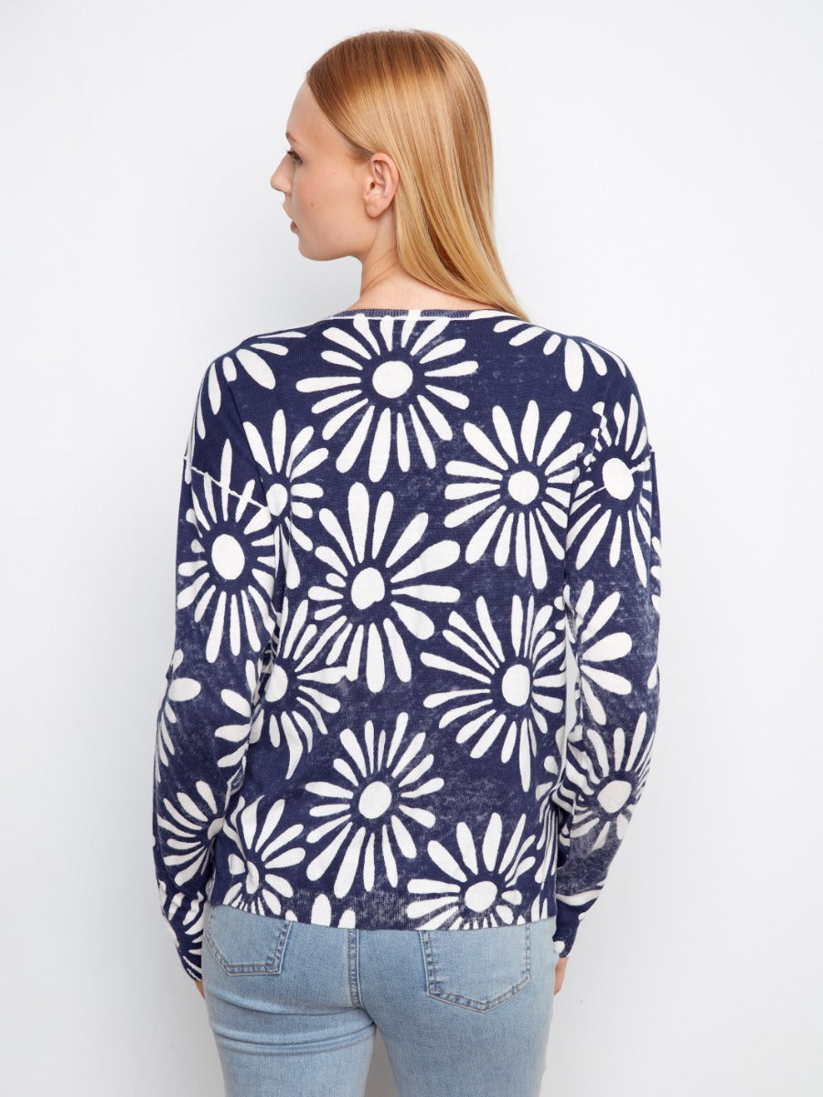 Charlie B Suns Out Ribbed Cotton V-Neck Sweater in navy with white floral pattern by Charlie B, styled with jeans