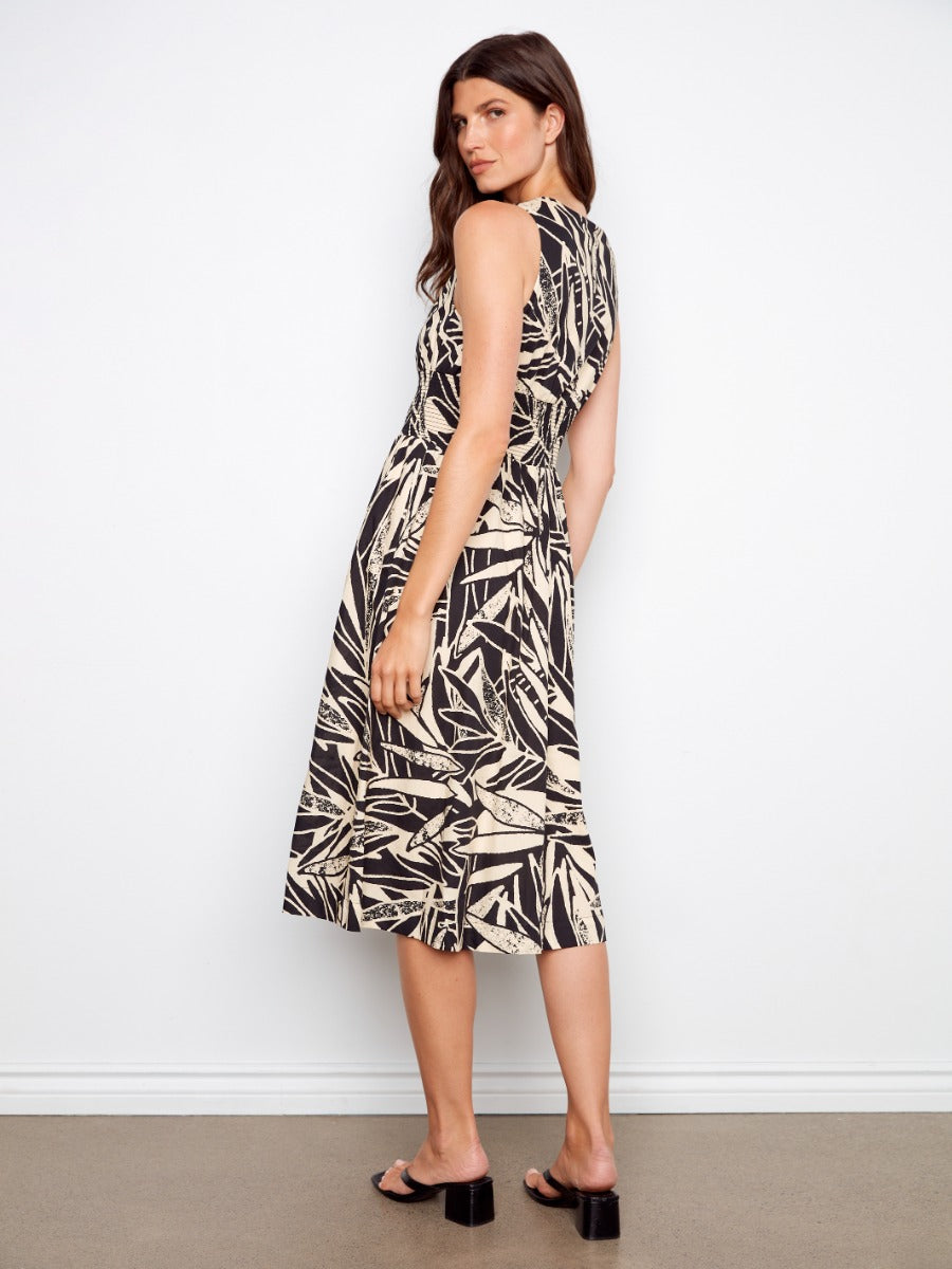 Model in black and beige patterned sleeveless midi dress by Charlie B Simon Printed Cotton Zip Front Midi Dress