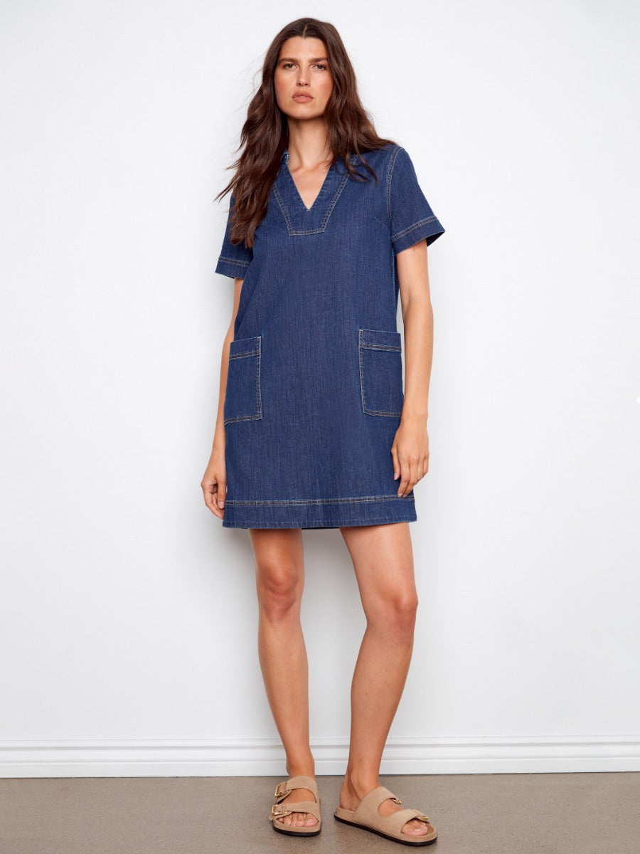Charlie B Double Pocket Short Sleeve Denim Dress in dark blue, featuring two front pockets and short sleeves.