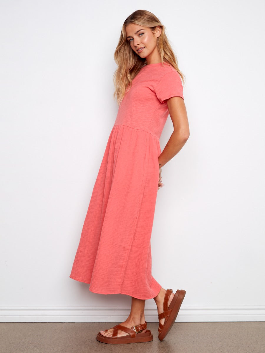 Charlie B Bubble Textured Short Sleeve Knit Dress in coral pink styled with brown sandals by Charlie B