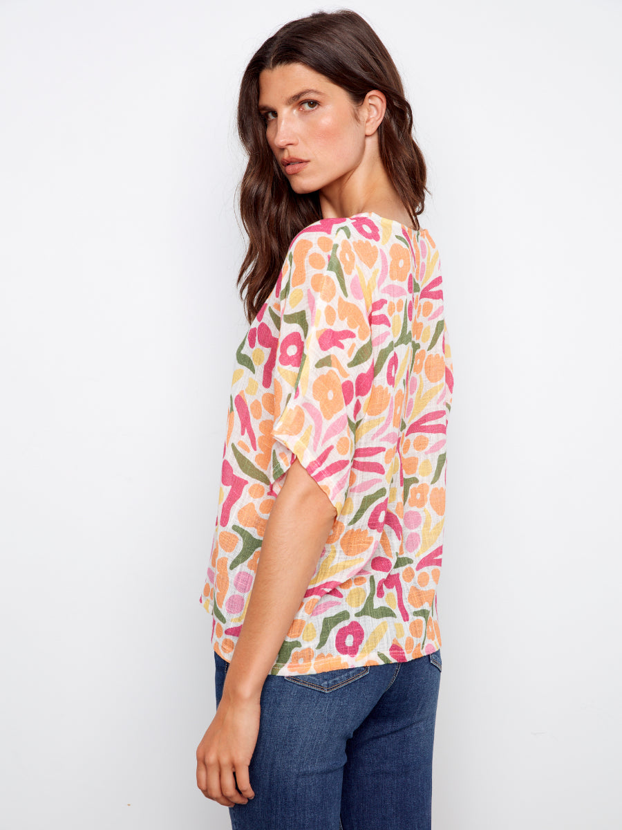 Charlie B Solstice Cotton Gauze Short Sleeve Top in multicolor floral pattern made from lightweight cotton gauze fabric