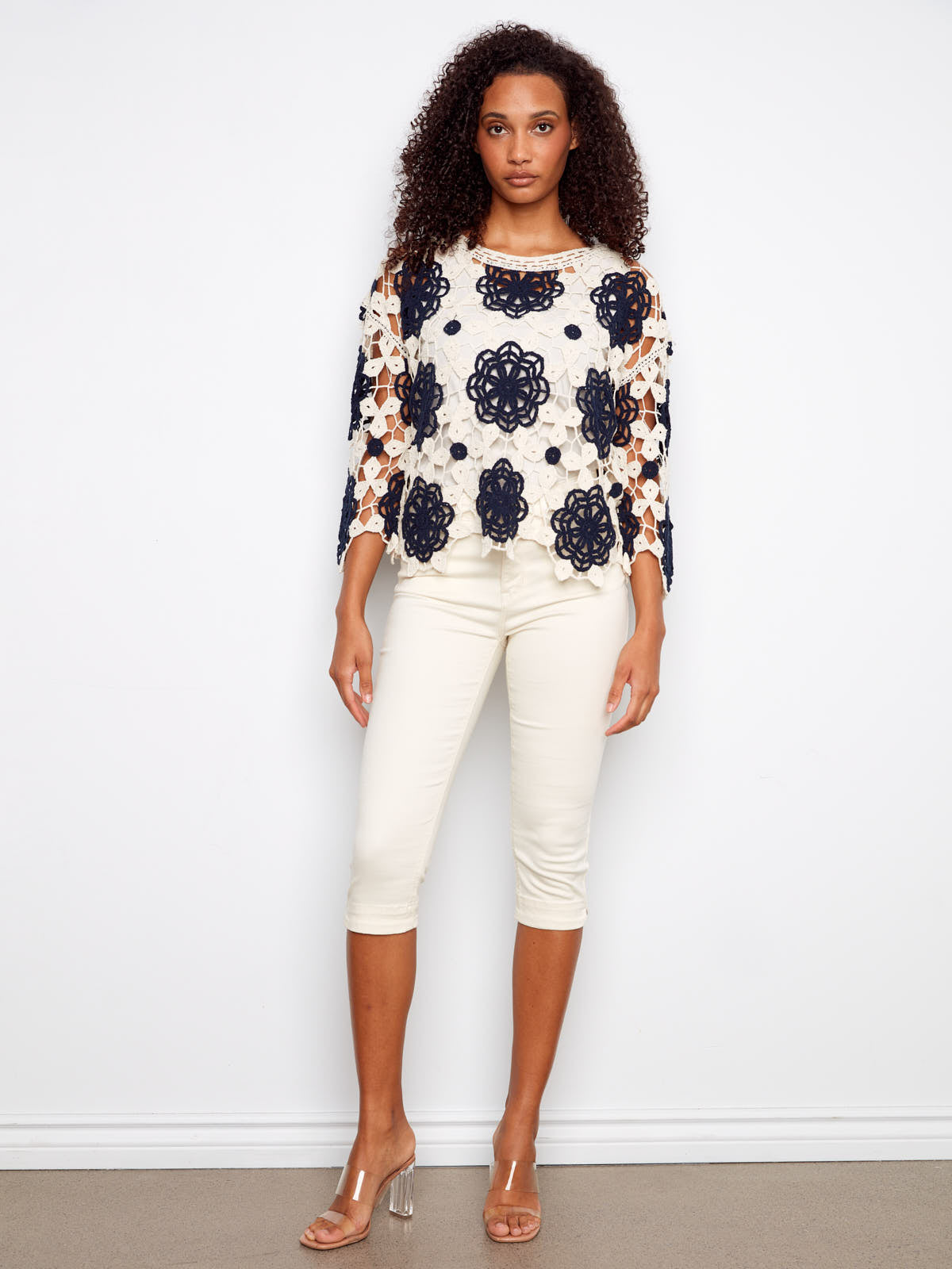 Charlie B Flower Crochet Crew Top in navy and cream crochet pattern worn with white cropped pants, by Charlie B.