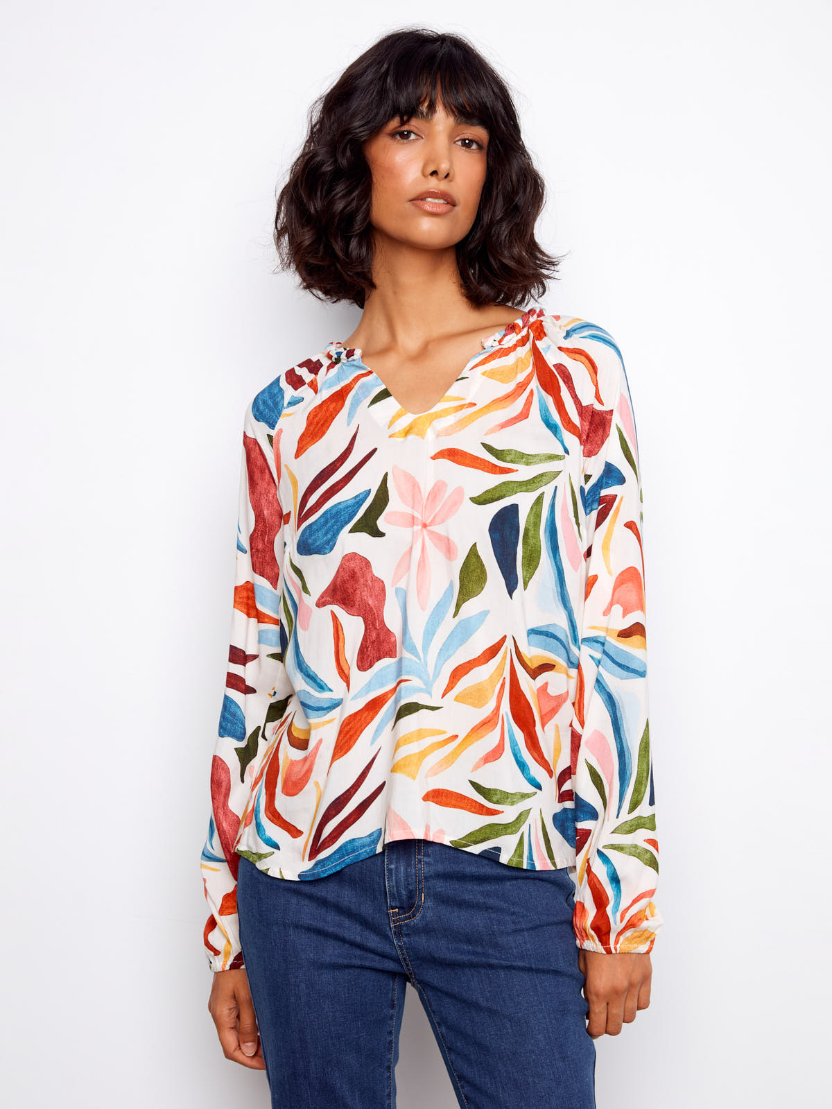 Charlie B Solstice V-Neck Raglan Top in multicolor leaf print, styled with jeans by Charlie B, casual tops collection