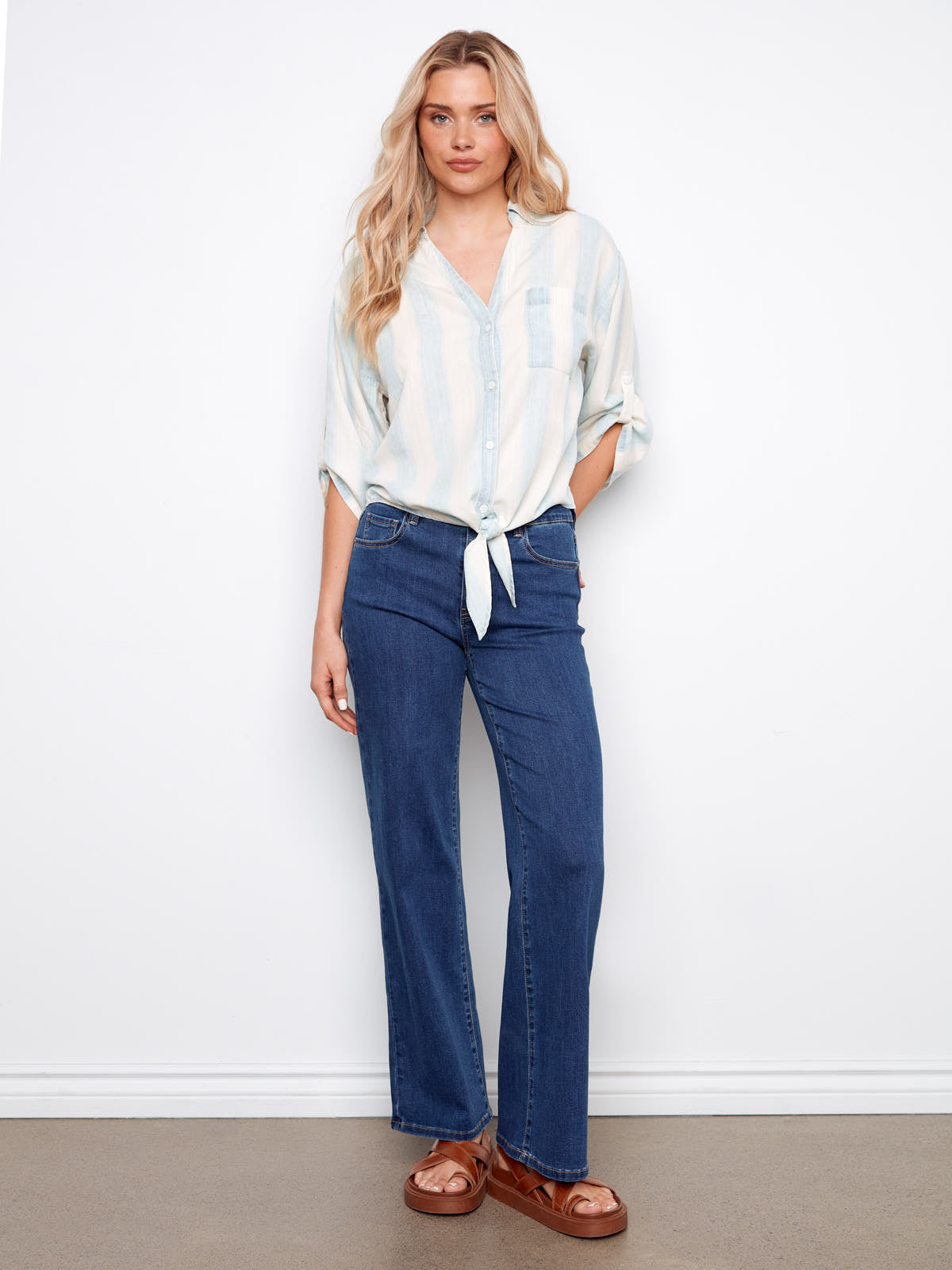 Charlie B Striped Linen Tie Front Top styled with denim jeans and sandals by Charlie B in soft blue and white tones