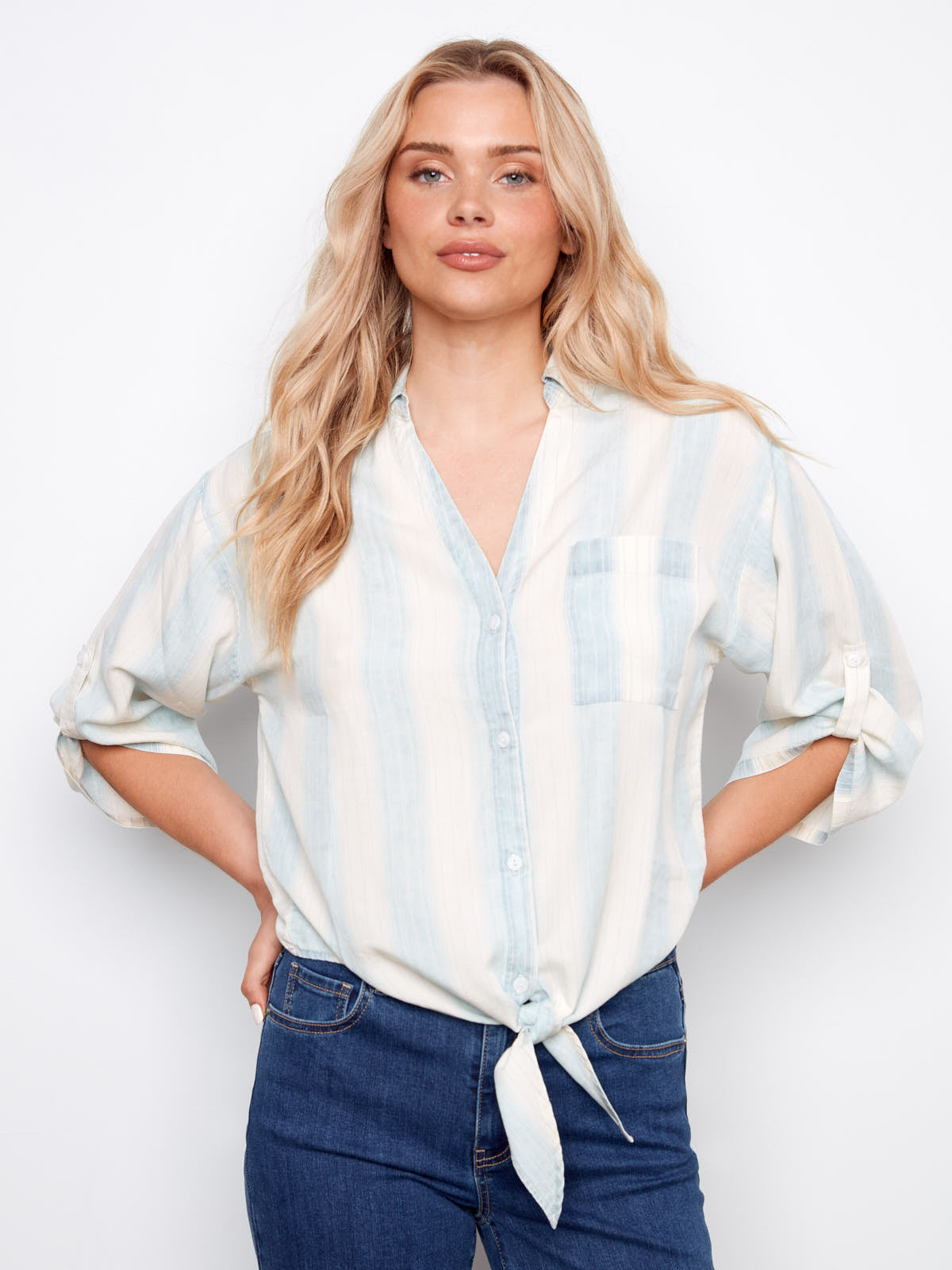 Charlie B Striped Linen Tie Front Top in soft blue and white stripes paired with blue denim jeans by Charlie B