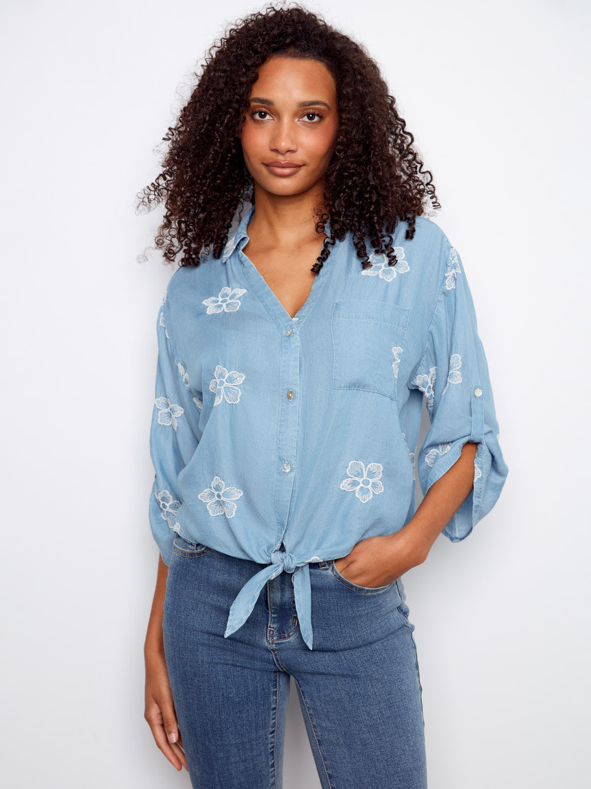 Charlie B Embroidered Flower Tencel Button Front Tie Top in blue with white floral embroidery from Charlie B tops collection