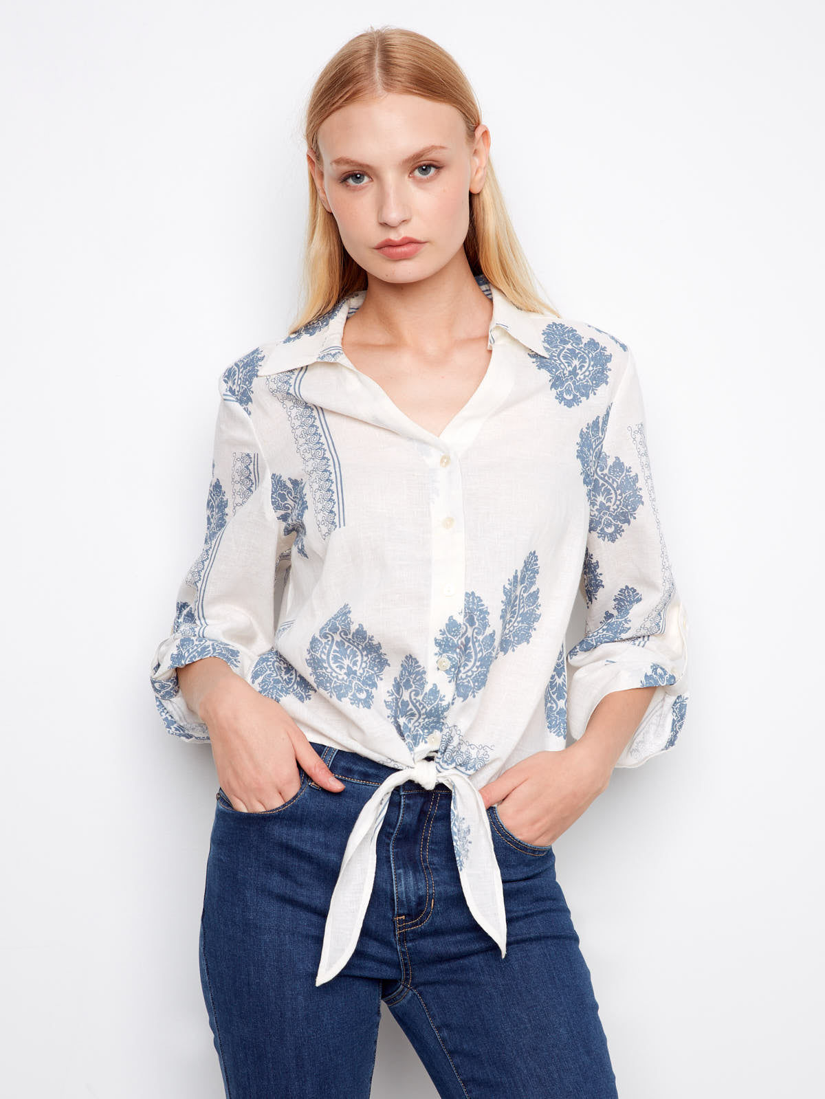 Charlie B Cool Guy Linen Button Front Tie Top in white with blue floral print, styled with blue denim jeans, by Charlie B