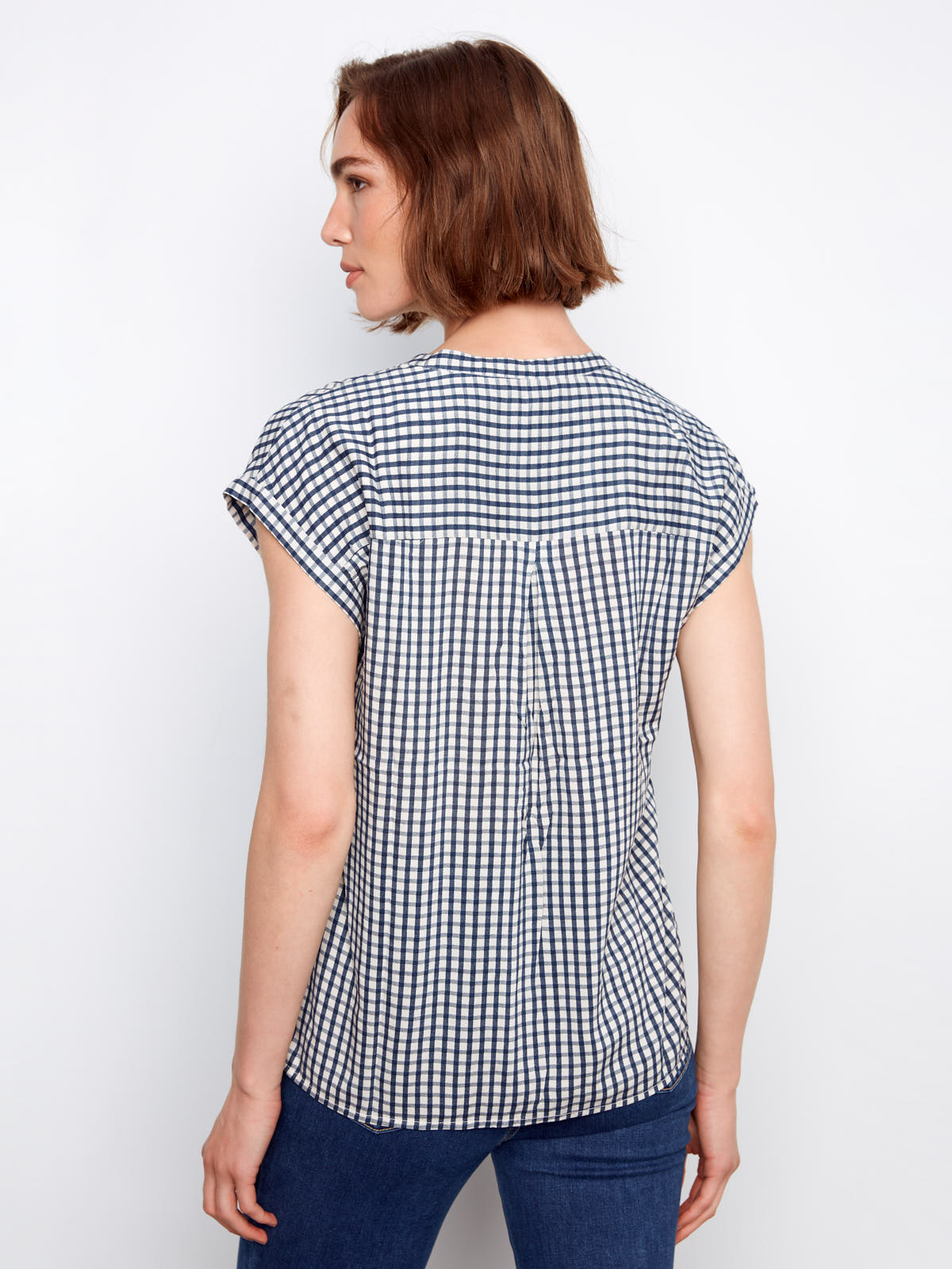 Back view of Charlie B Nautical Gingham Button Front Top by Charlie B in navy gingham pattern with short sleeves.