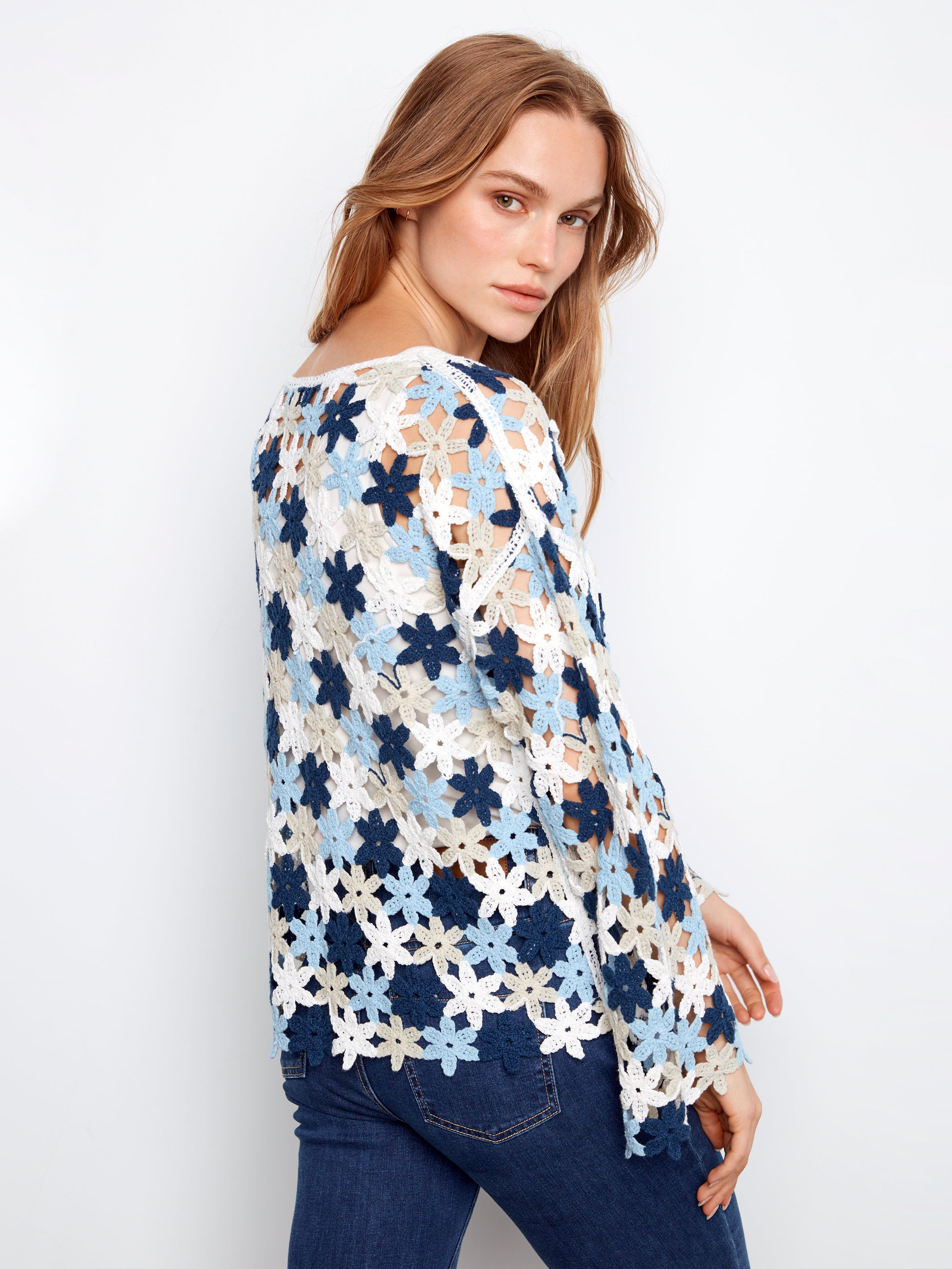 Charlie B Flower Crochet Top in blue and white floral pattern, paired with dark denim jeans, elegant and casual style