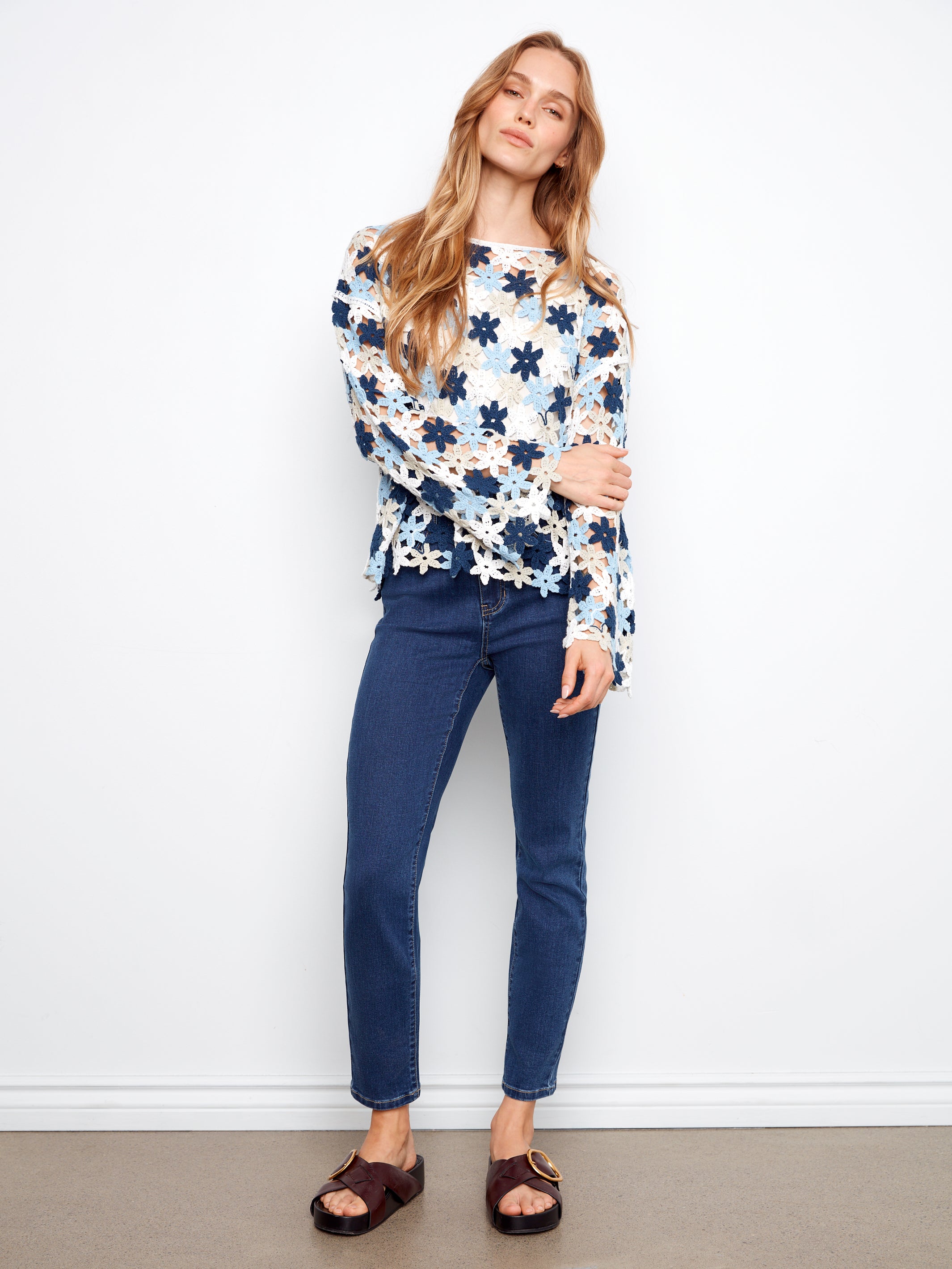 Charlie B Flower Crochet Top in blue and white floral design paired with dark blue jeans by Charlie B