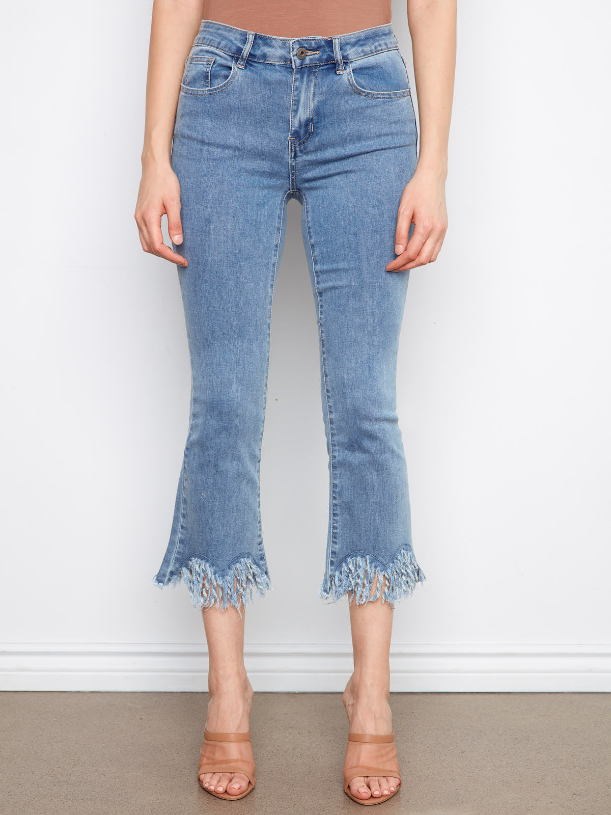Charlie B Fray N Fringe 26” Denim Capris in light blue with frayed hem detail from Charlie B denim collection