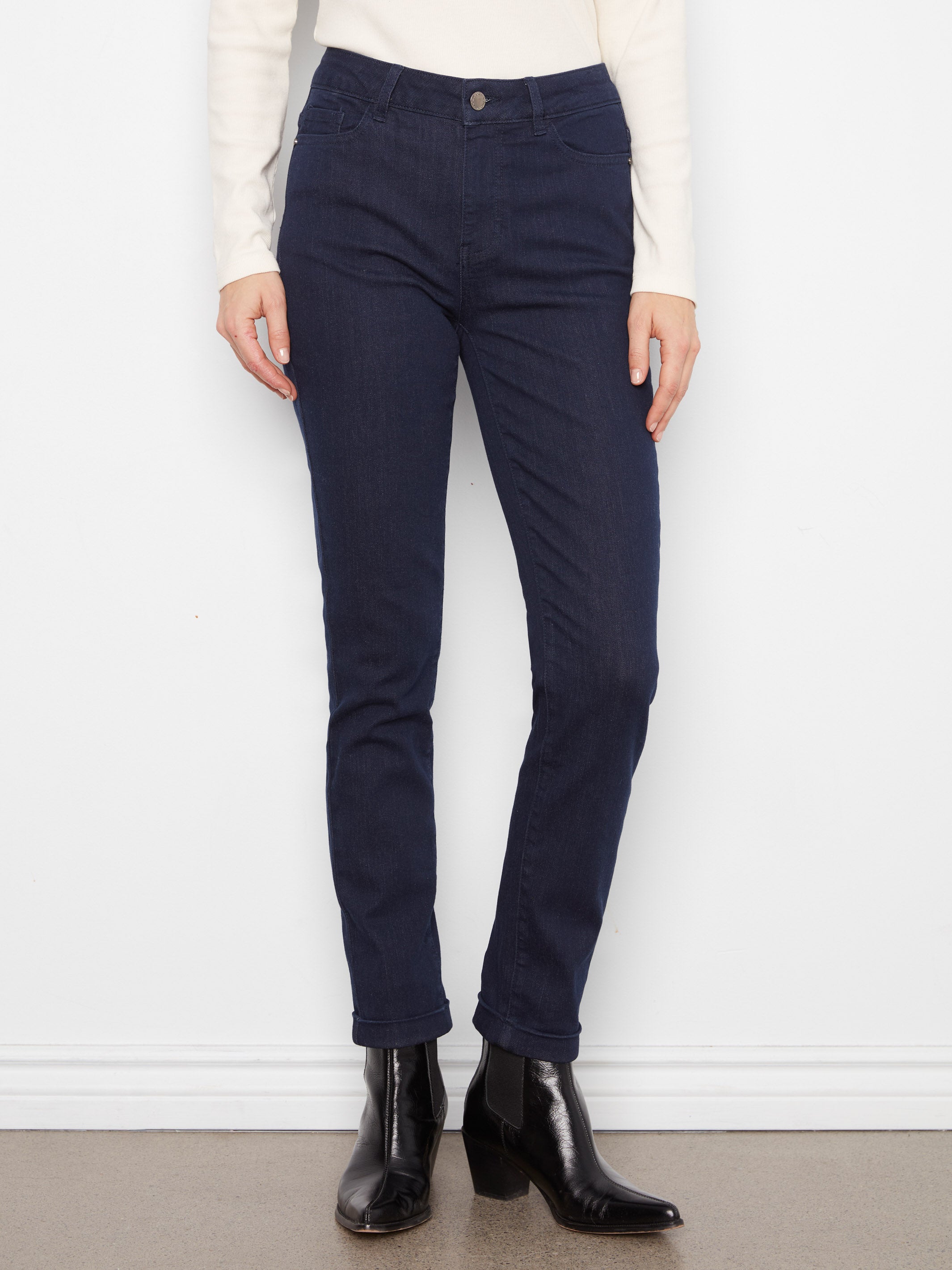 Charlie B The Cuff 5-Pocket 29.5" Slim Leg Denim Jeans in dark wash paired with black ankle boots by Charlie B.